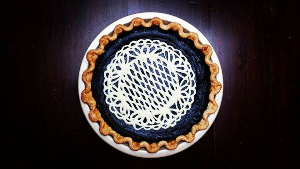Cocoa Pumpkin Pie with white chocolate doily