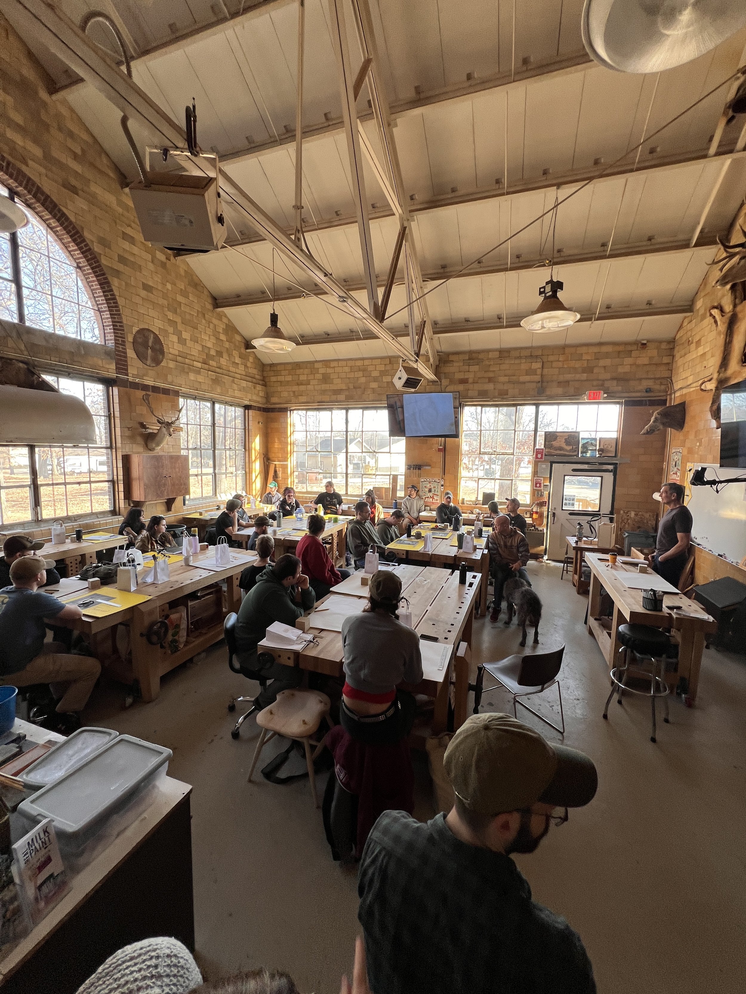 A group of finish carpentry students learning to draw