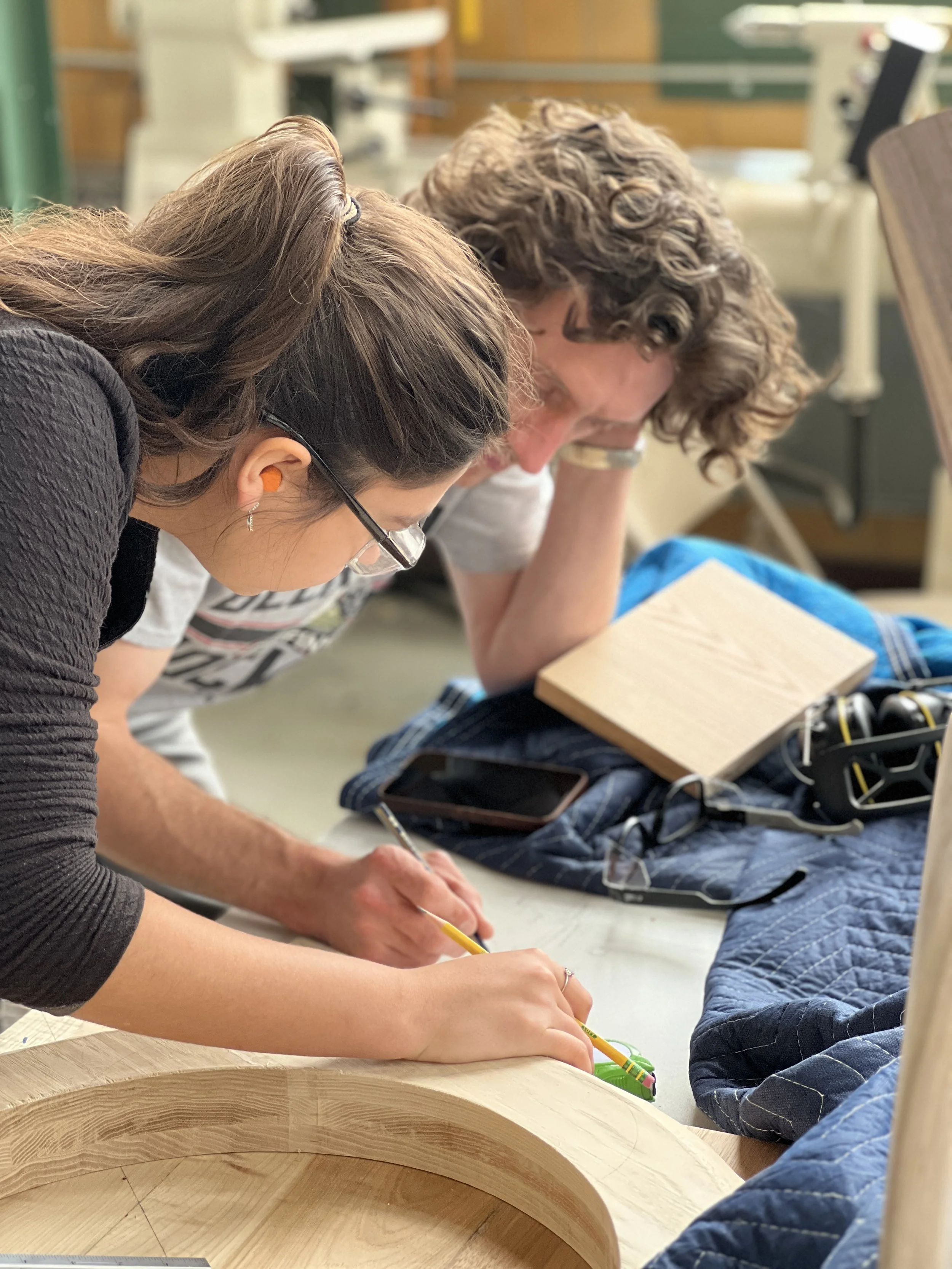 Two Furniture Design students working together to solve design problems.