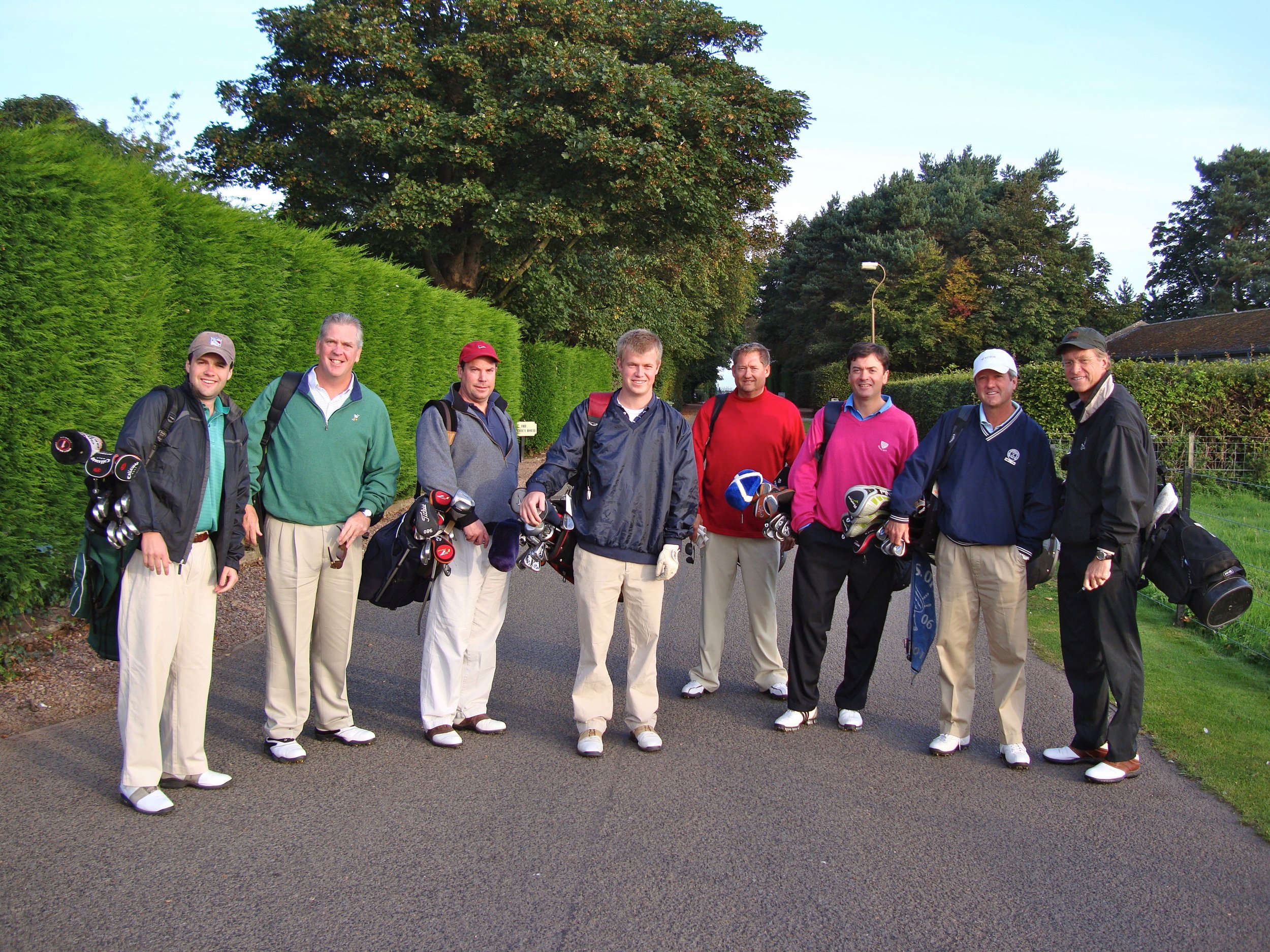 The walk down the drive to Muirfield's hallowed turf...with a few friends in 2009. The course kicked our butts, but we would play again at the drop of a hat if we could.