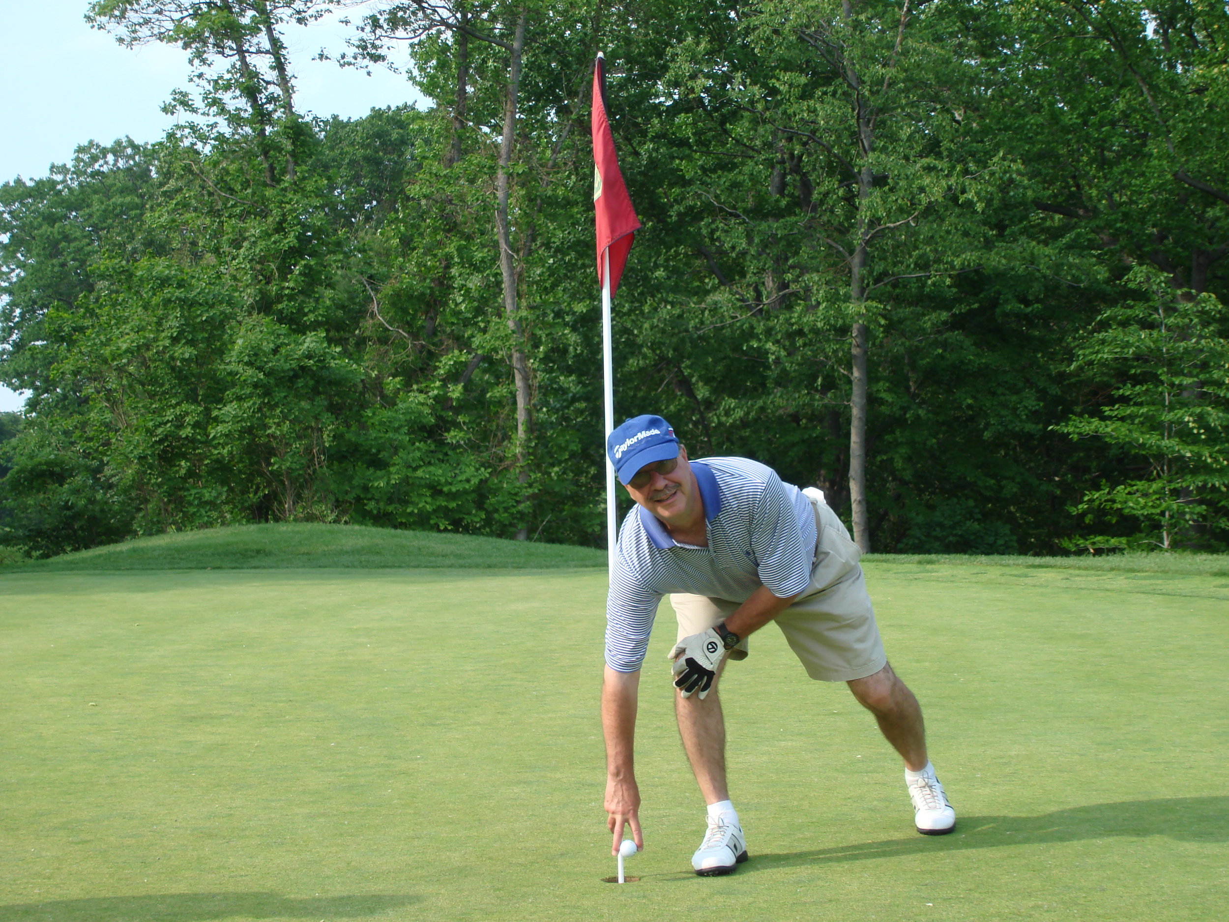 My dear friend Fred Cuccia, a former President who did more to restore BBCC than anyone, deservedly retrieve's the ball from a hole in one on 15. 2010.