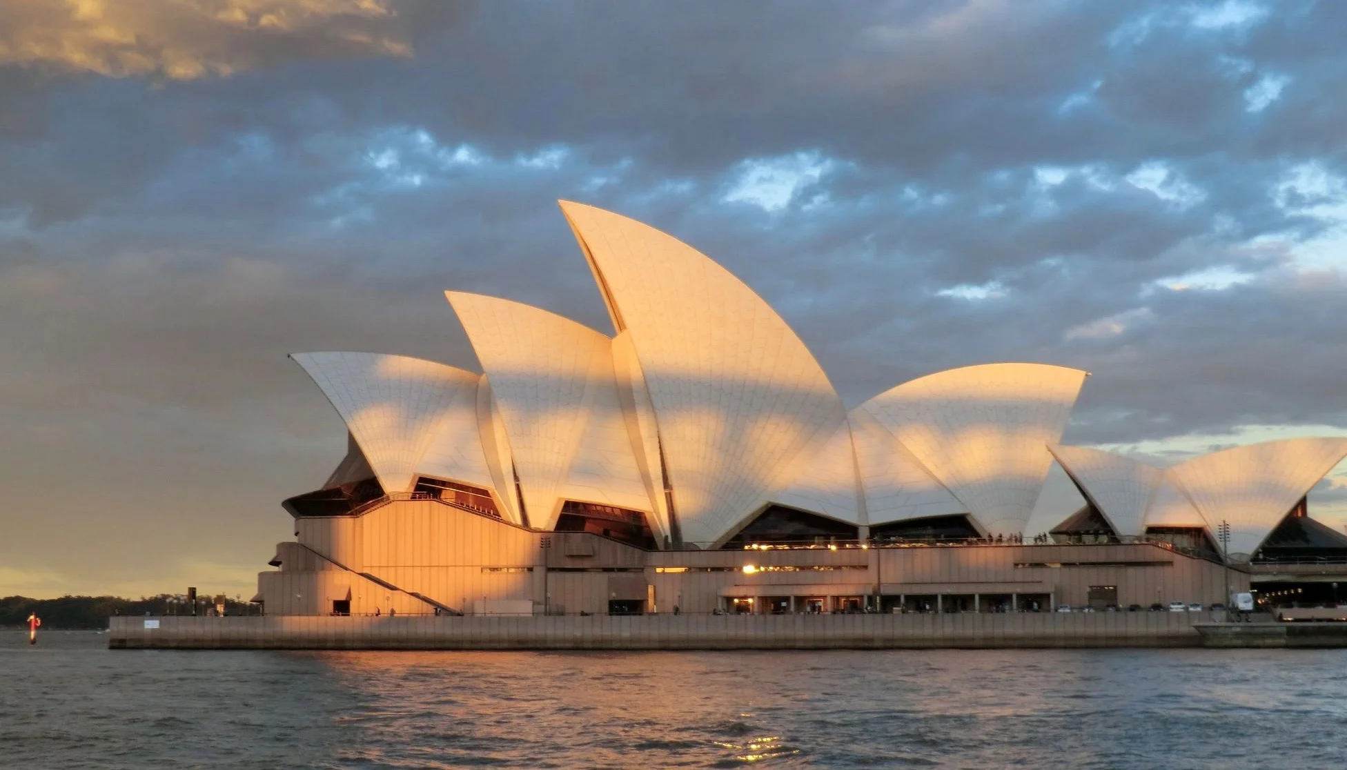 The iconic Opera House with the shadow of the harbor bridge: cool picture I think.