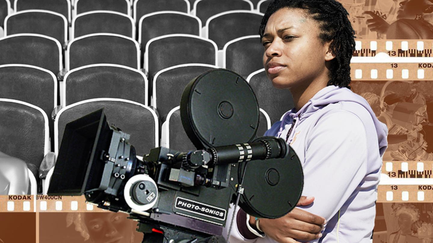 Black woman filmmaker outside