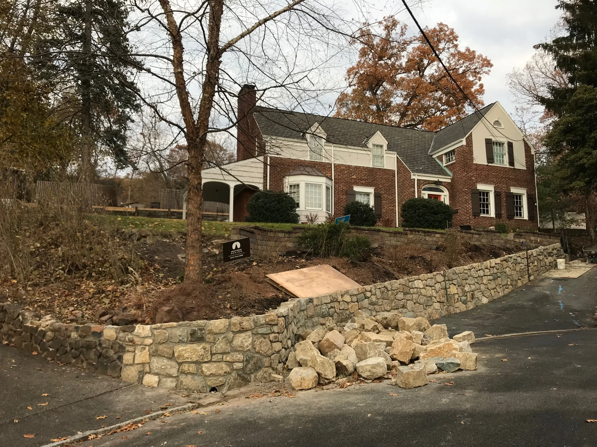 The driveway wall, no landscaping yet but it already looks so much better!