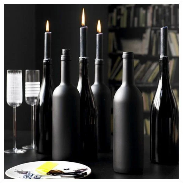 You can also spray paint your wine bottles a black matte and black gloss finish. Use your old wine bottles as candle holders with black candlesticks. 