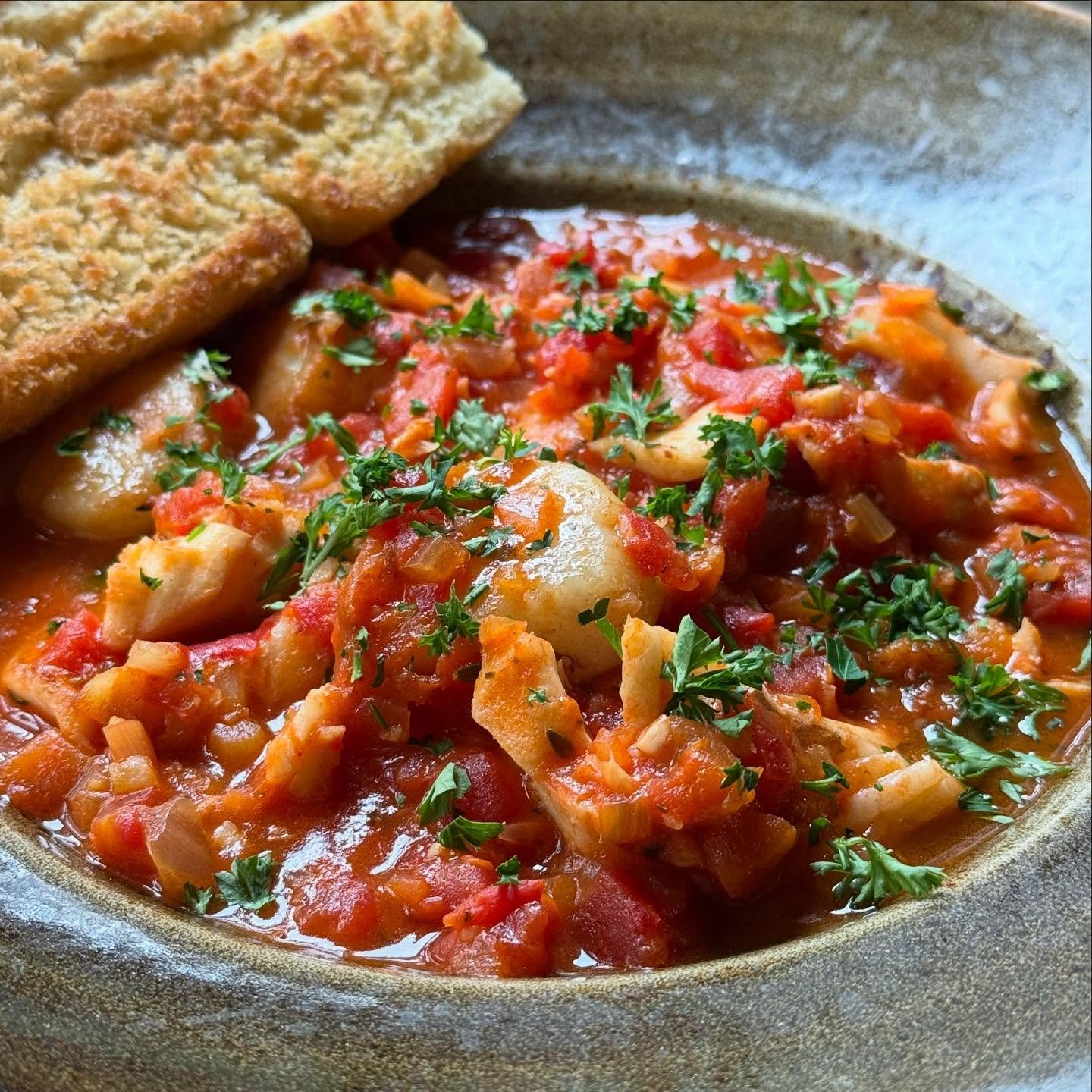 Our Seafood Saturday Special: Cioppino - A Rustic Seafood Stew with a medley of Scallops, Shrimp, and Haddock in a Tomato and Wine Broth and served with our Homemade Focaccia Bread.

#seafoodsaturday #cioppino #lathamhousetavern #uppervalley #eatloca