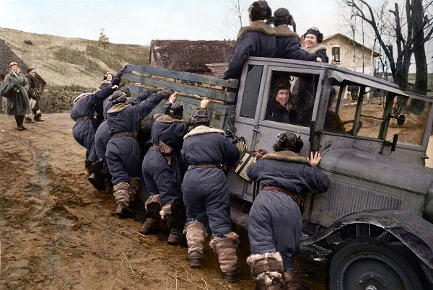 Crimea 1944 - Soviet Female Fighter Pilots pushinga ZIS-5 lorry