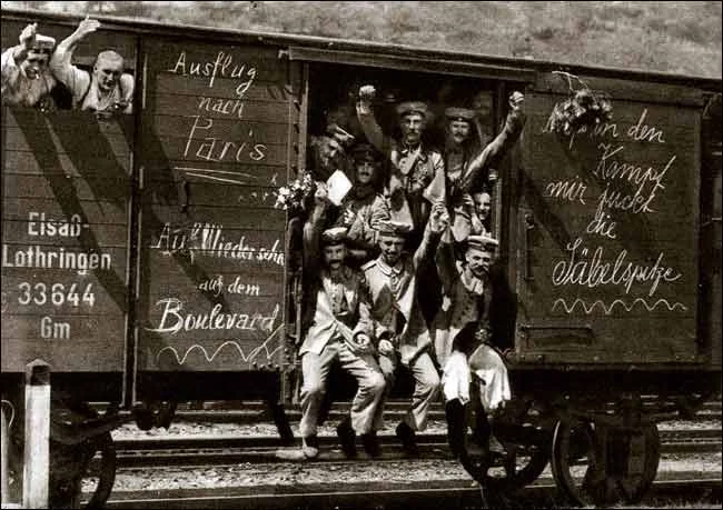 German_soldiers_in_a_railroad_car_on_the_way_to_the_front_during_early_World_War_I,_taken_in_1914._Taken_from_greatwar.nl_site.jpg