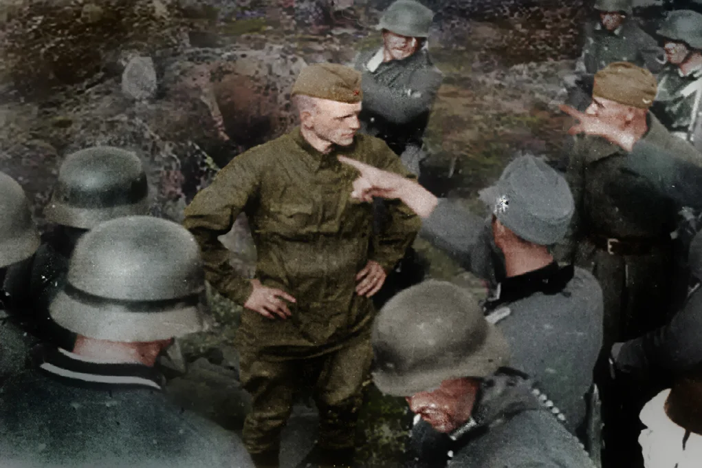 This picture taken on June 30, 1941 shows German Jagers from 136th Tyrol Mountain Regiment of the 2nd Mountain Division of the Mountain Corps Norway extrajudicially killing Soviet POWs. Barely a week into the war, Soviet POWs, who bear their heads high and facing death, are executed on sight.
