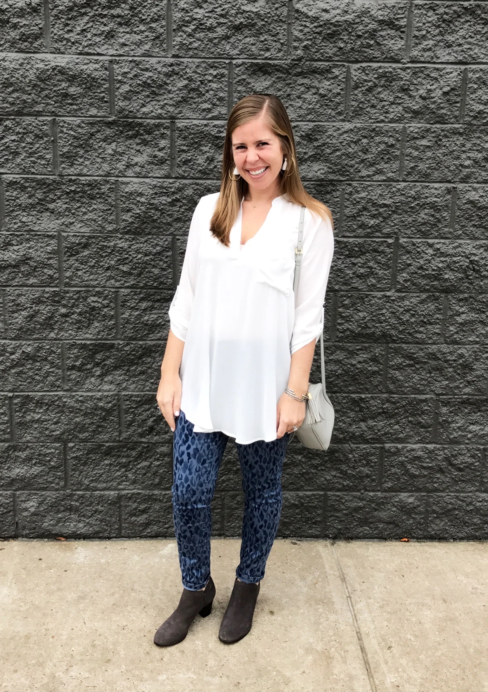 Outfit details: Tunic // Jeans // Booties // Crossbody Bag // Earrings