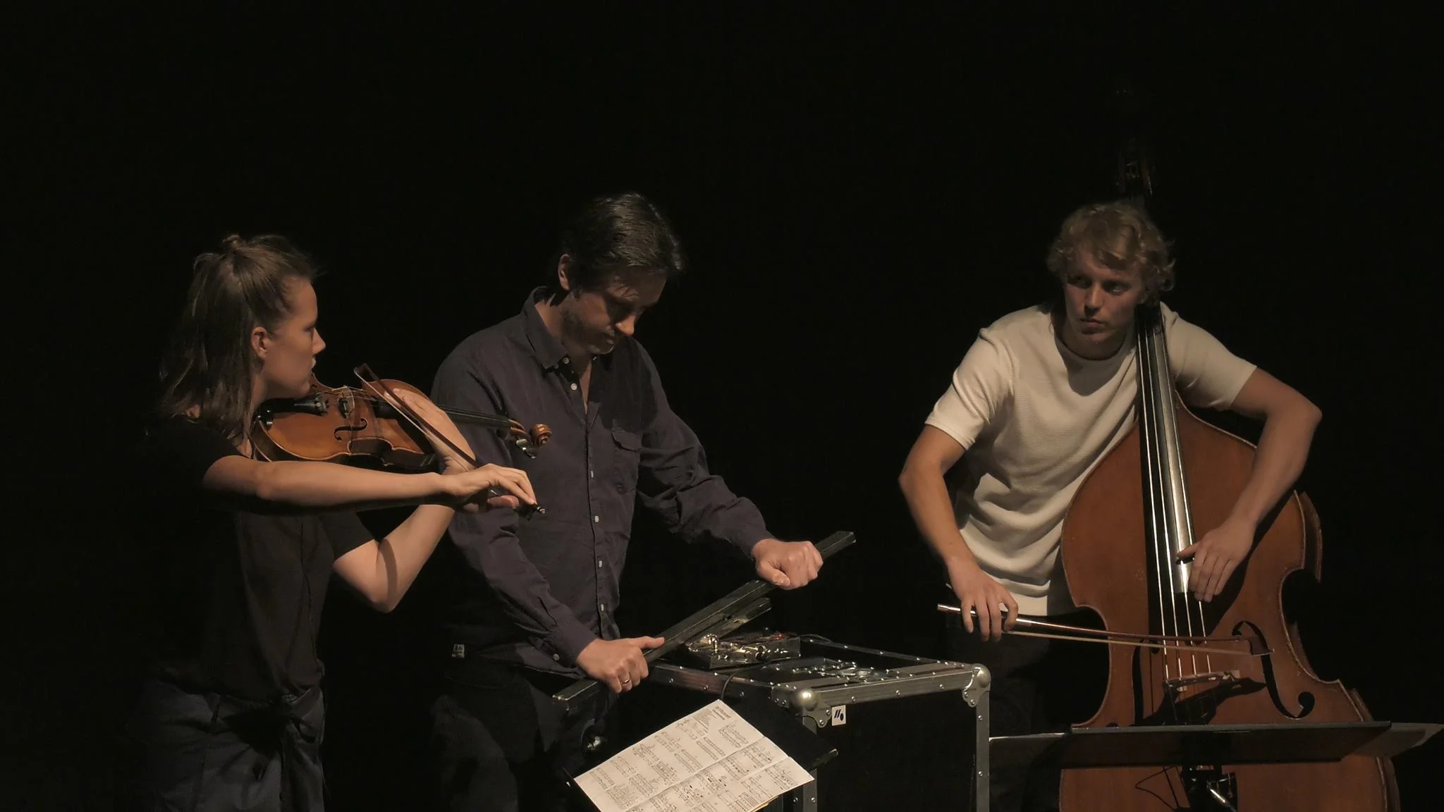 Faculty member Simon Steen-Andersen performs his composition "Study for String Instrument #2" with festival participants at Musikhuset Aarhus. —NMFS 2016
