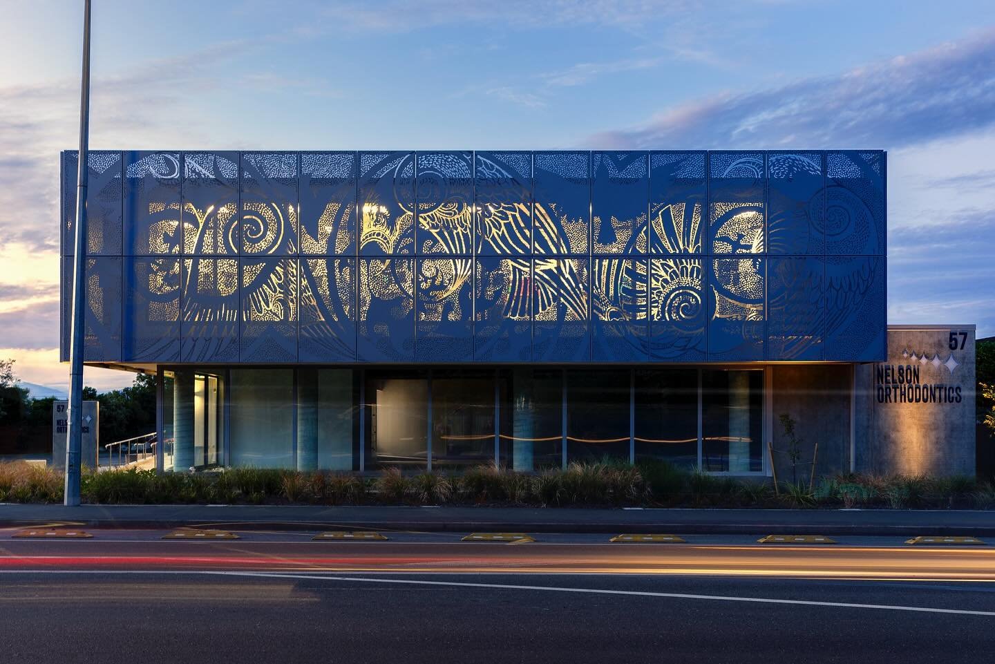 Nelson Orthodontics Richmond Practice, 2023 - A state of the art clinic with a street presence that pops. The perforated screens featuring art by Golden Bay&rsquo;s Robin Slow are an asset to the community.

The interior living wall greets you at the