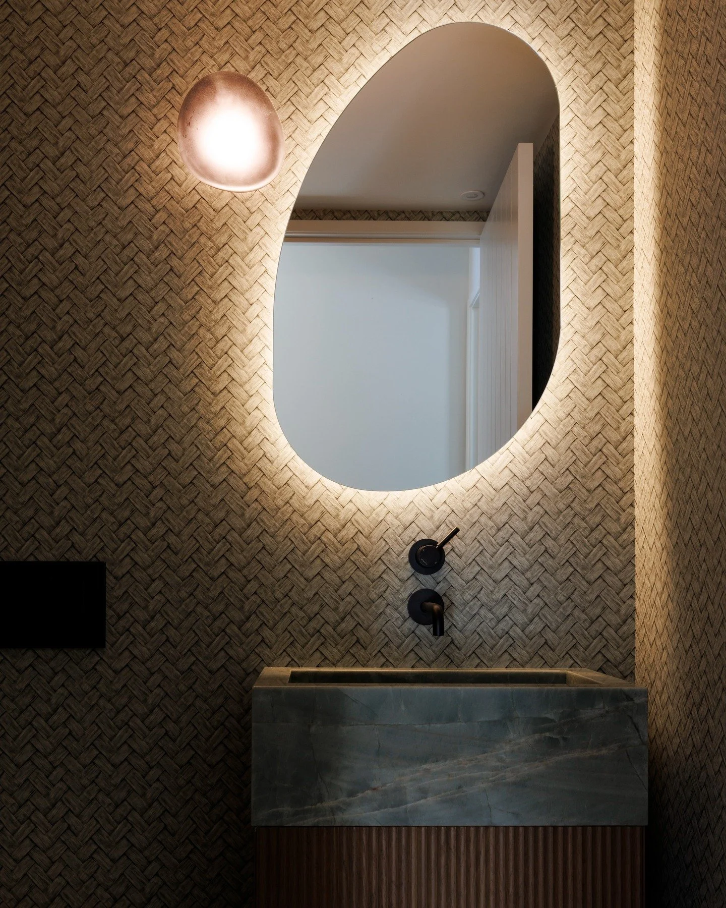 A sneak peak at our latest project to be photographed. This moody powder room has a Mystique Green Quartzite basin set on a @featurecraft_ fluted cabinet. Keep your eyes peeled for more shots of this exciting project coming soon 👀

📸 @virginiawoolf