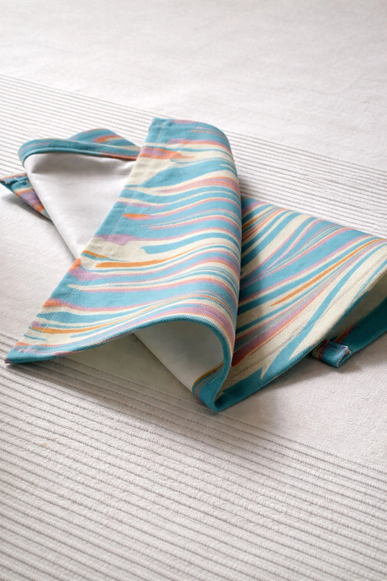 detail of woven cotton marbled placemat Aspen Mist handmade Italian table linen