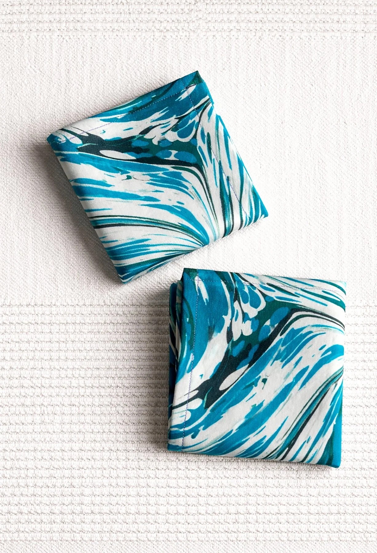 serviettes cocktail coton motif marbré bleu océan réutilisables linge de table italie