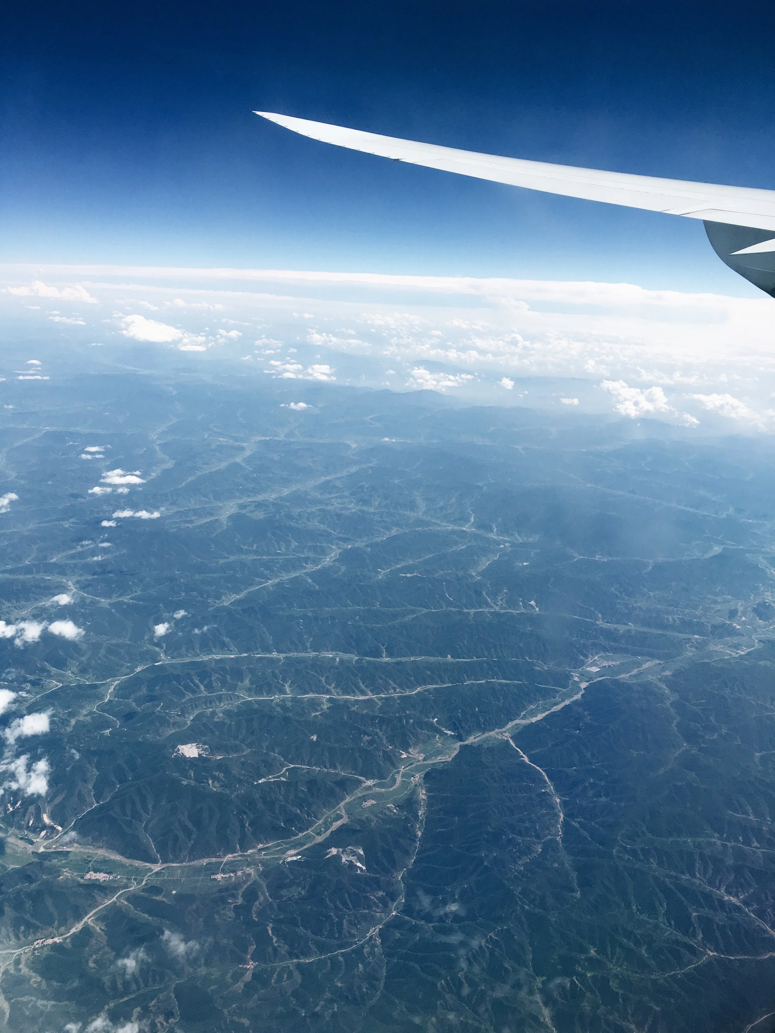 Some views are just worth the plane ride... Somewhere over China! 