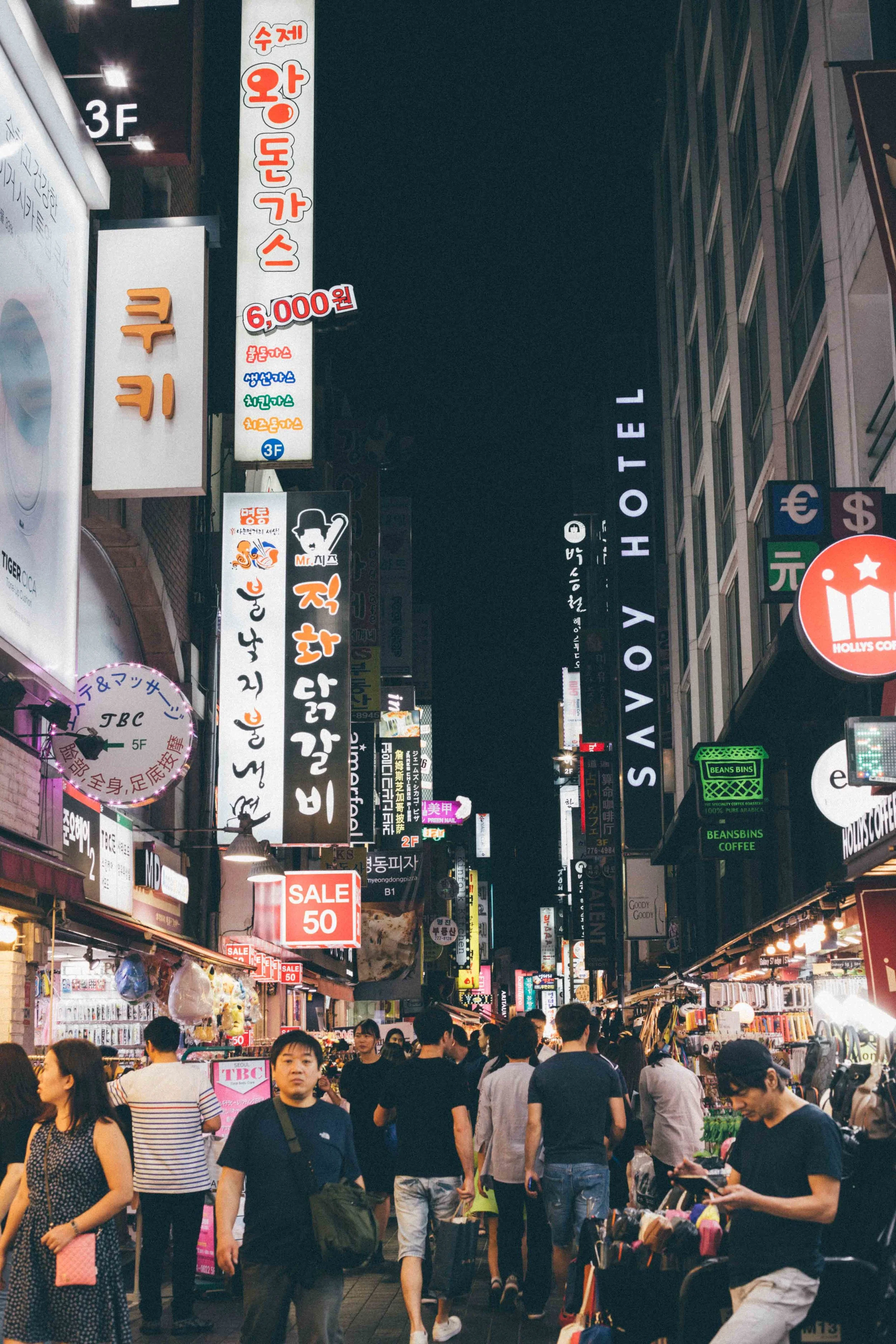 The Myeongdong neighbourhood at night, buzzing.