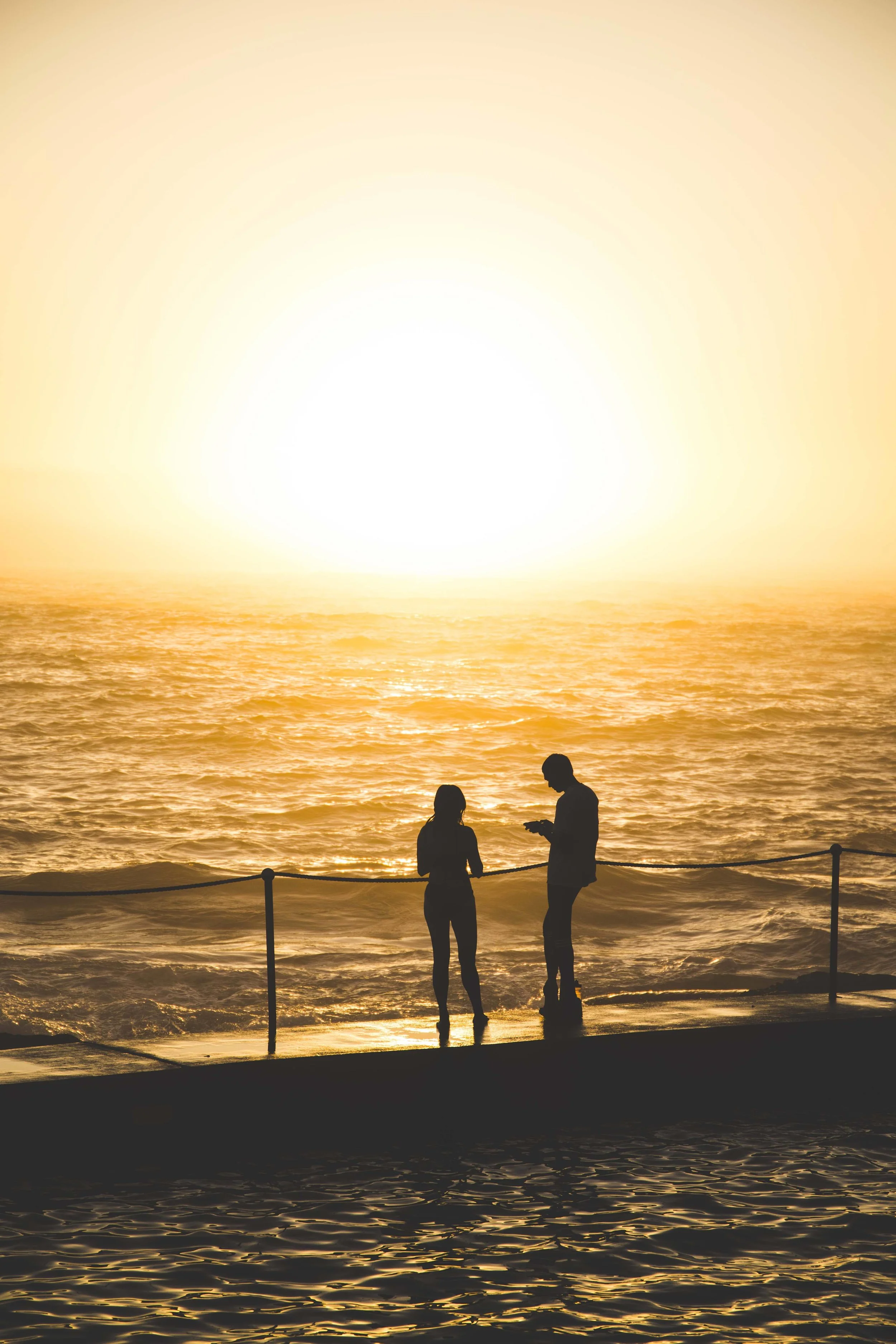 People enjoying sunrise at Bronte Beach Rockpool. Photo: Marine Raynard