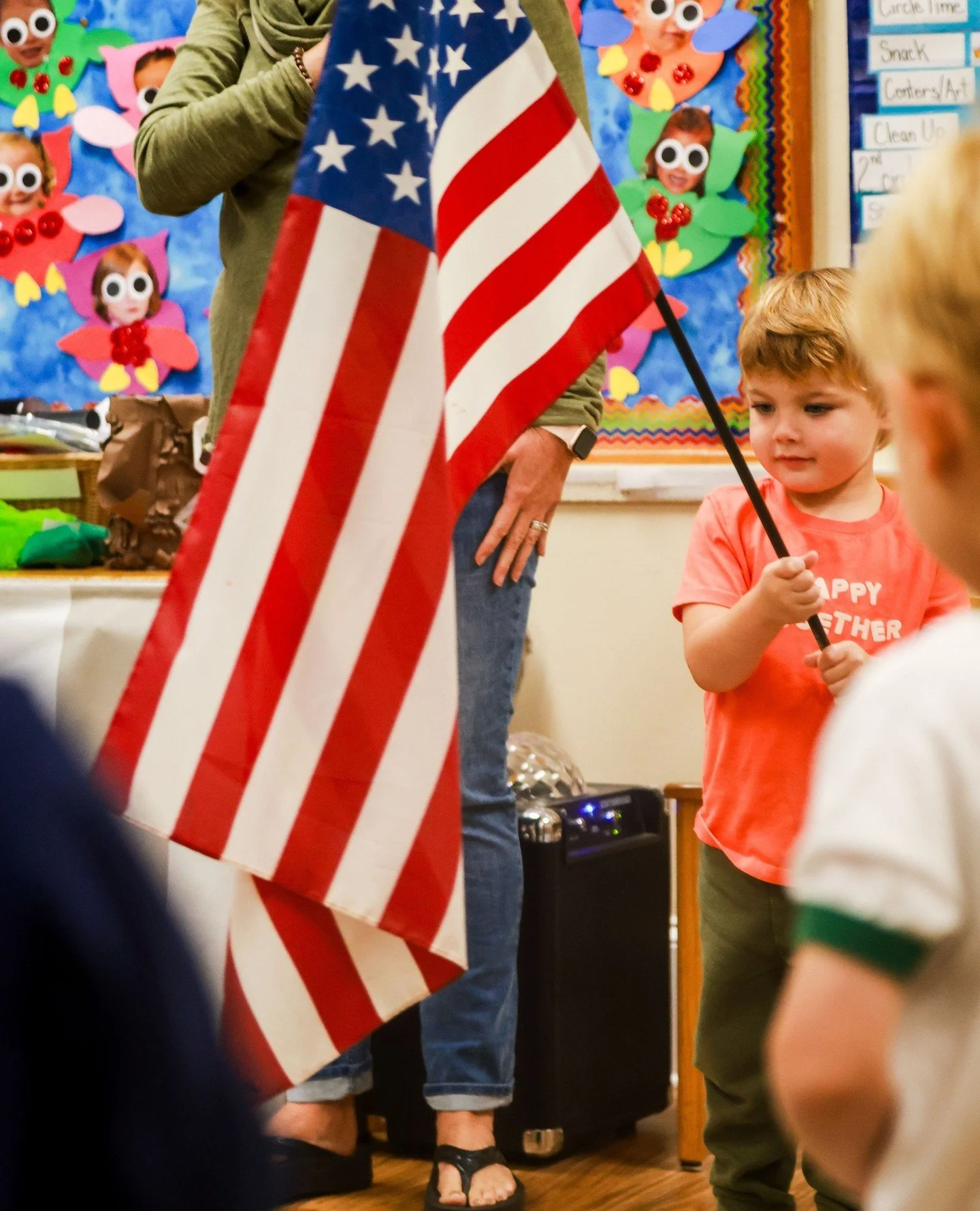 Simple rituals make a big difference. When children gather for the Pledge or share morning news, they feel grounded, connected, and ready to learn together.
