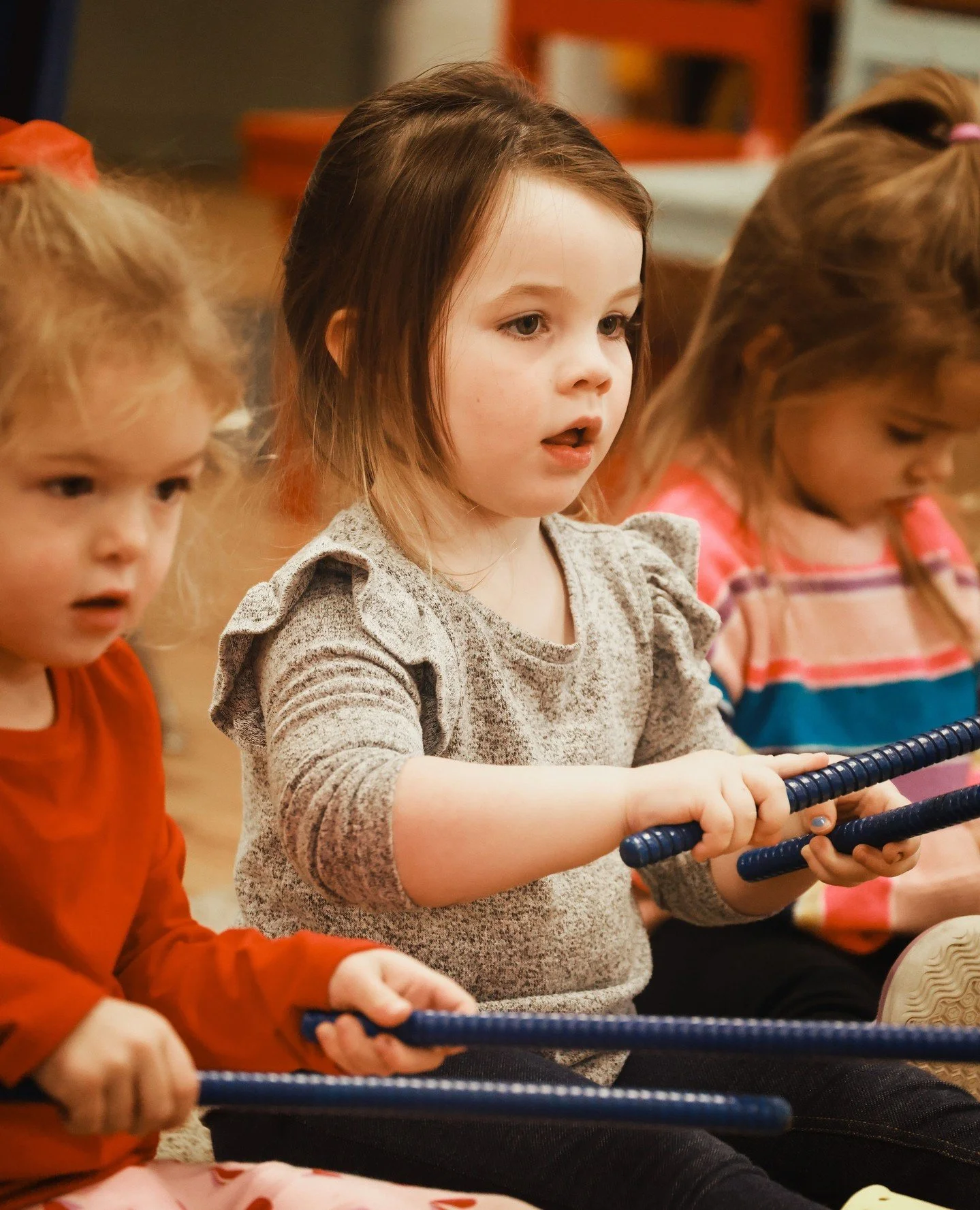 Manipulating instruments enhances fine and gross motor skills, hand-eye coordination, and spatial awareness.