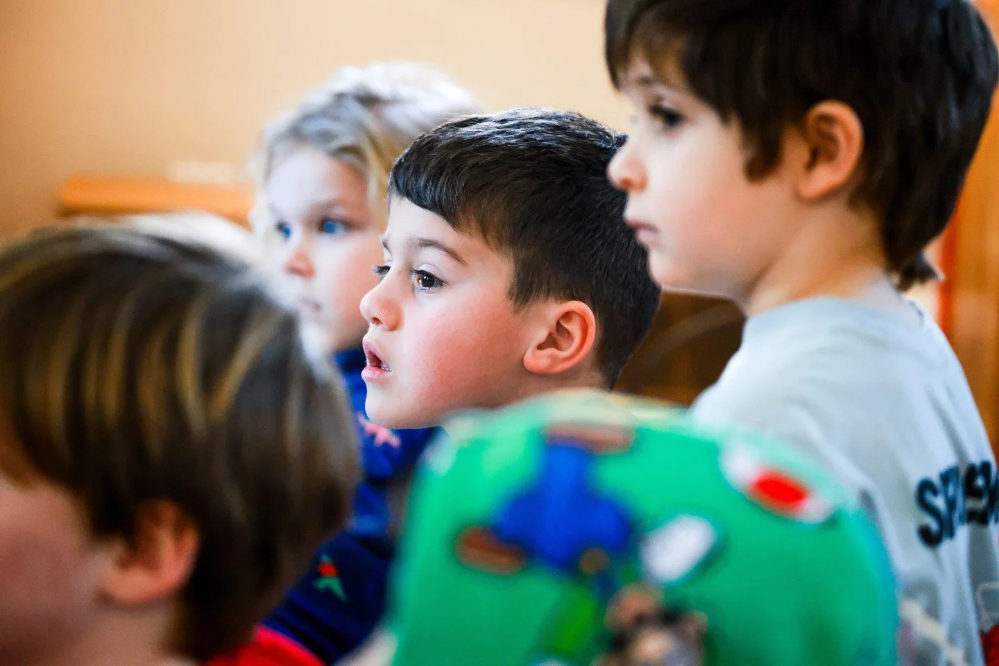 Every day at WEEMS begins with a morning meeting where children greet each other by name, share personal news, and participate in a group activity. This fosters a sense of belonging and teaches children about community and respect.