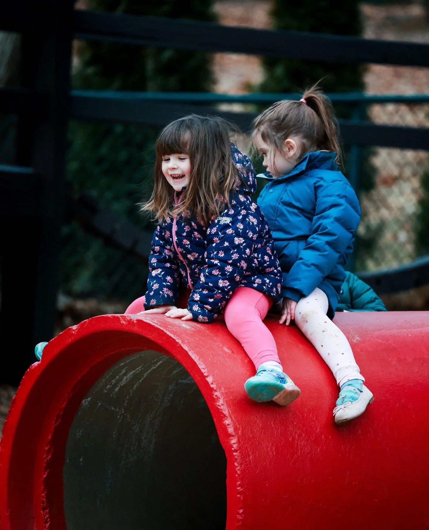 Playgrounds provide opportunities to develop gross motor skills like climbing, jumping, running, and balancing on equipment, which improves agility and coordination.
