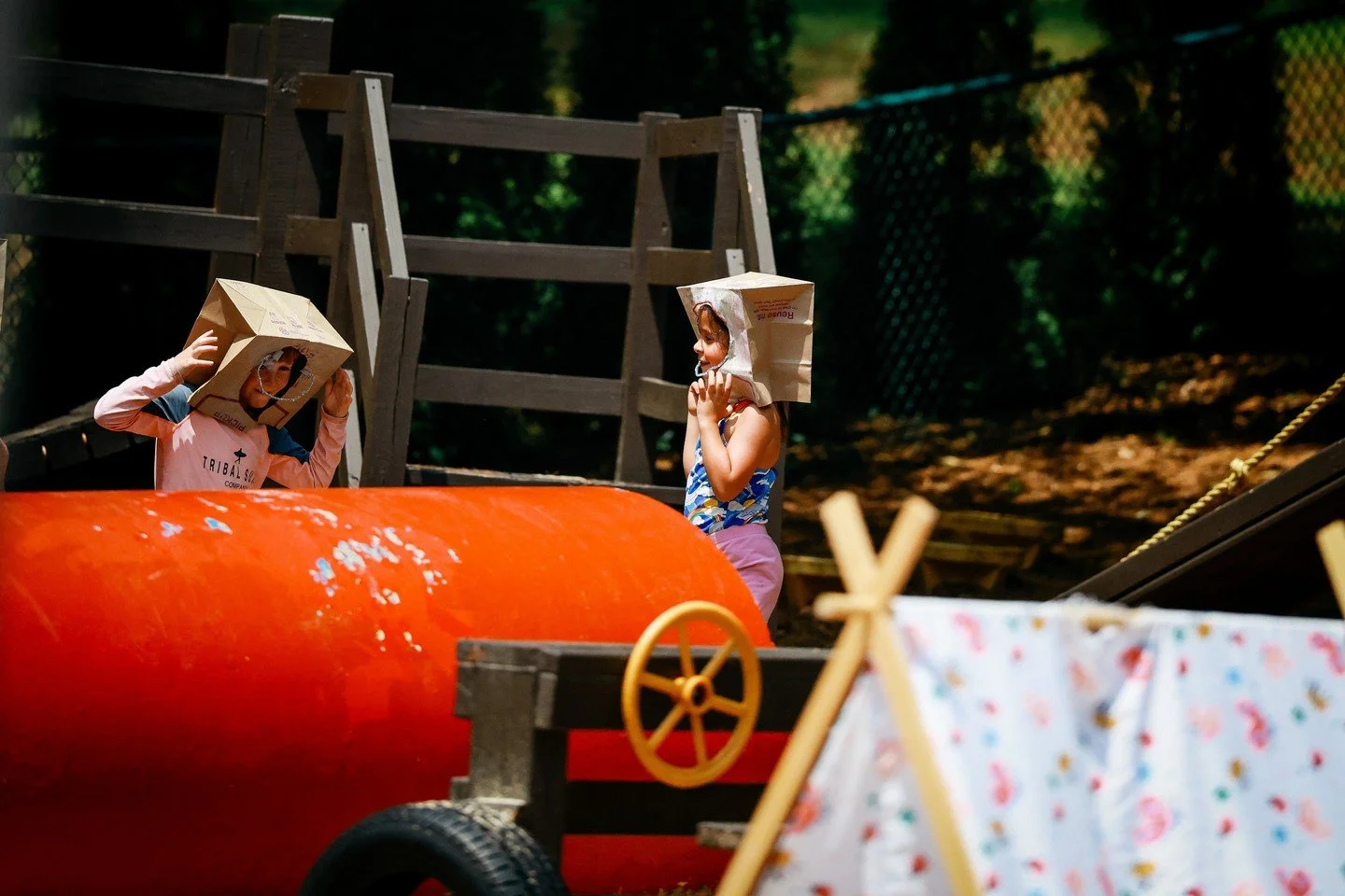 Transforming bags into puppets or masks fosters independence through dramatic play.