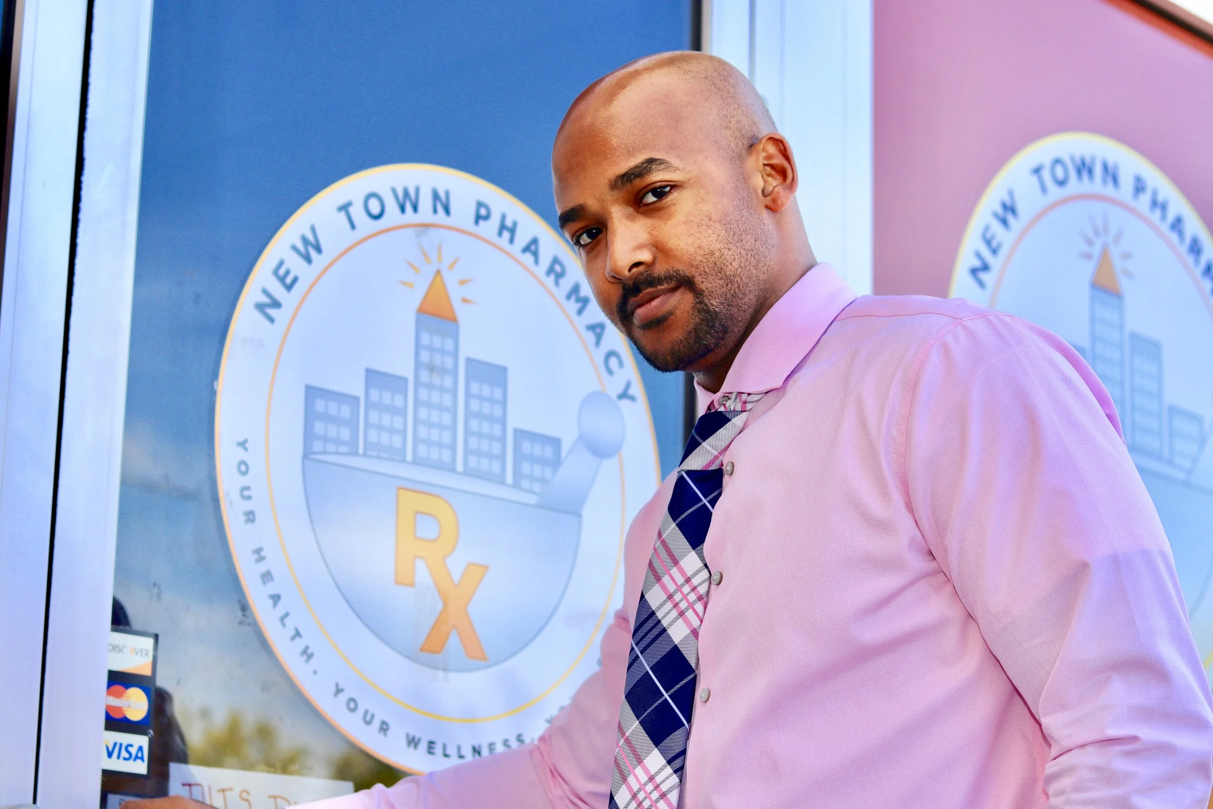 Dr. Albert Chester outside of New Town Pharmacy 3416 Moncrief Rd. Photo by The Talented Tenth
