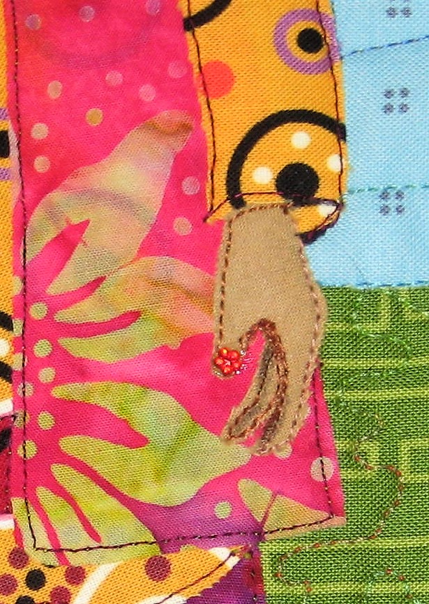 The hand applique is also very small as well. I added a tiny red flower to represent a painted thumbnail-details, details!! The book bag batik fabric had a happy accident when the flower motif ended up in a perfect position on the bag! I couldn't have done that if I tried! The next challenge due September 30, 2017 is Steampunk. One of me favorite portrait quilts that I made in 2015 has a steam punk theme. This new quilt will be much smaller and it will have plenty of gears!