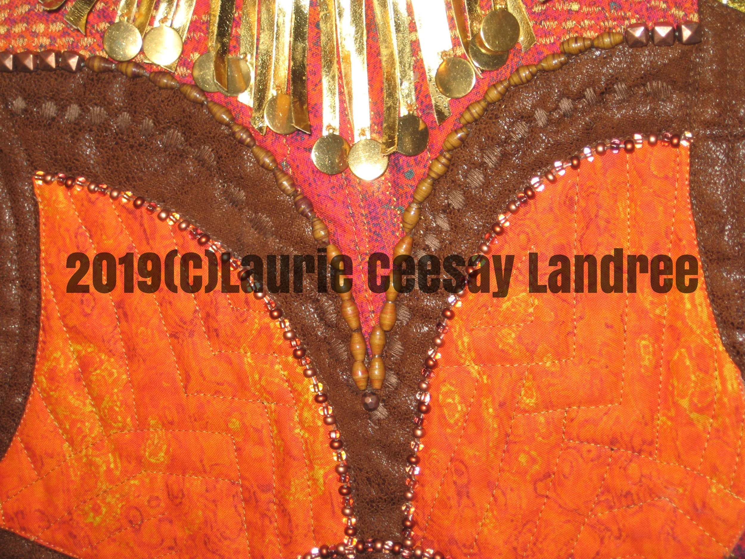 The garment stitching was in an unusual pattern on the bodice and sleeves-lots of metallic gold thread.