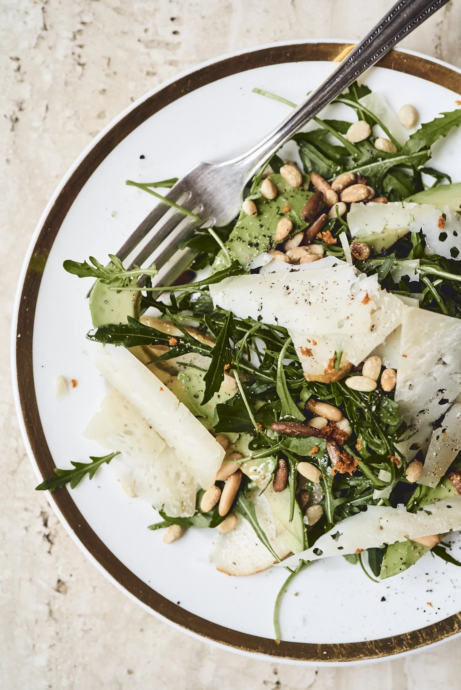 rucola, pear, avocado, and pine salad