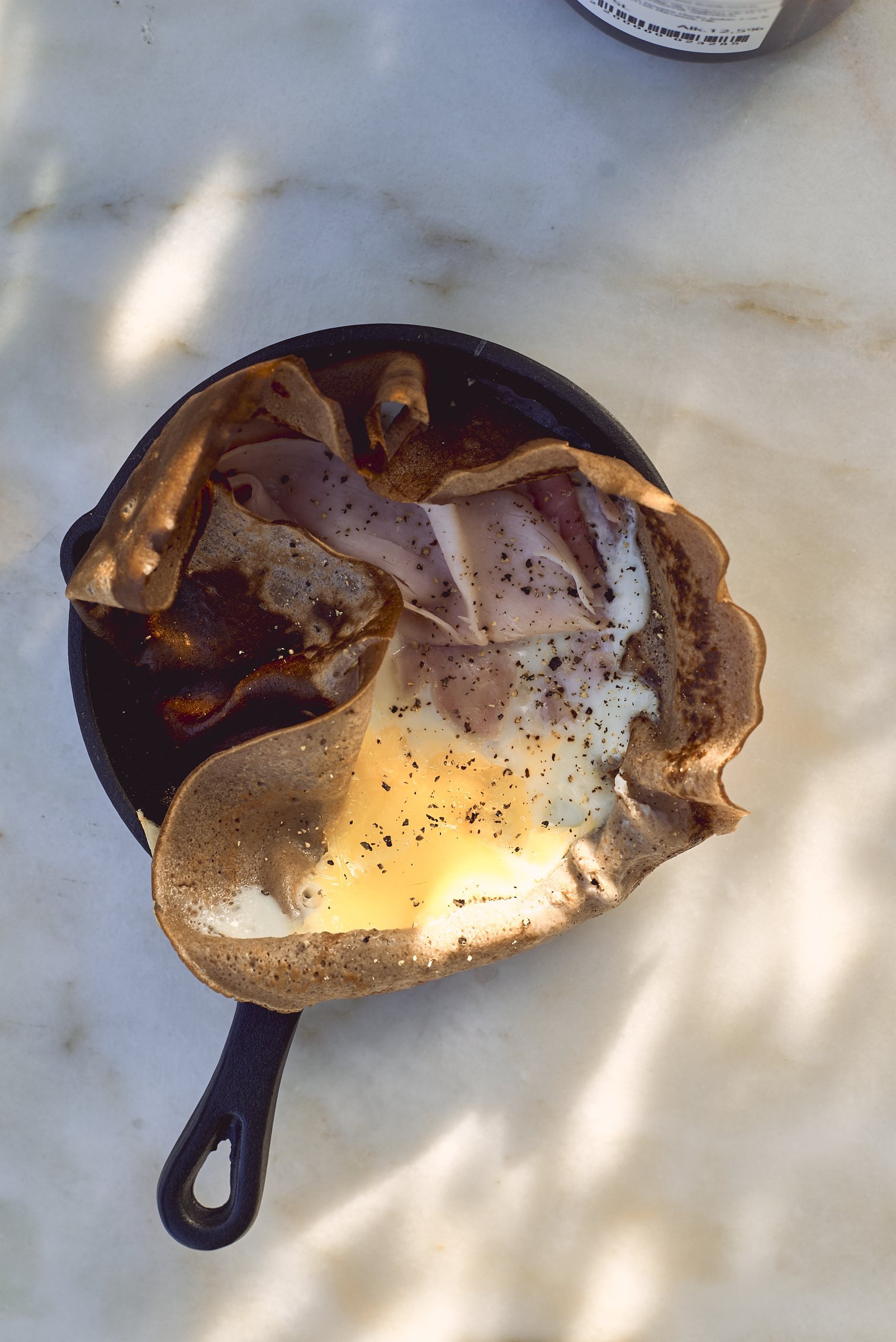 Chestnut pancakes with ham and egg