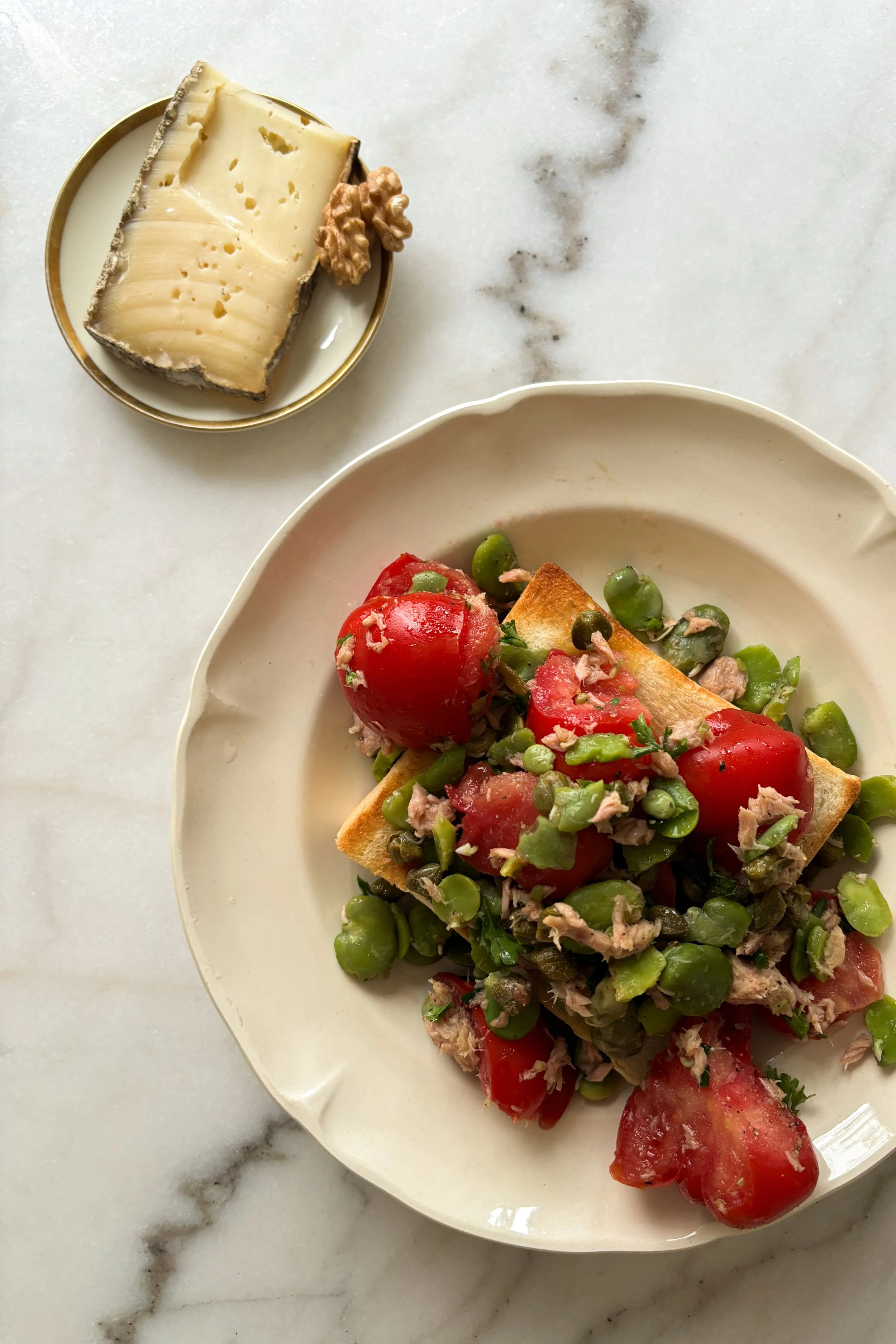 dinner for 1. broad beans and tomato on toast