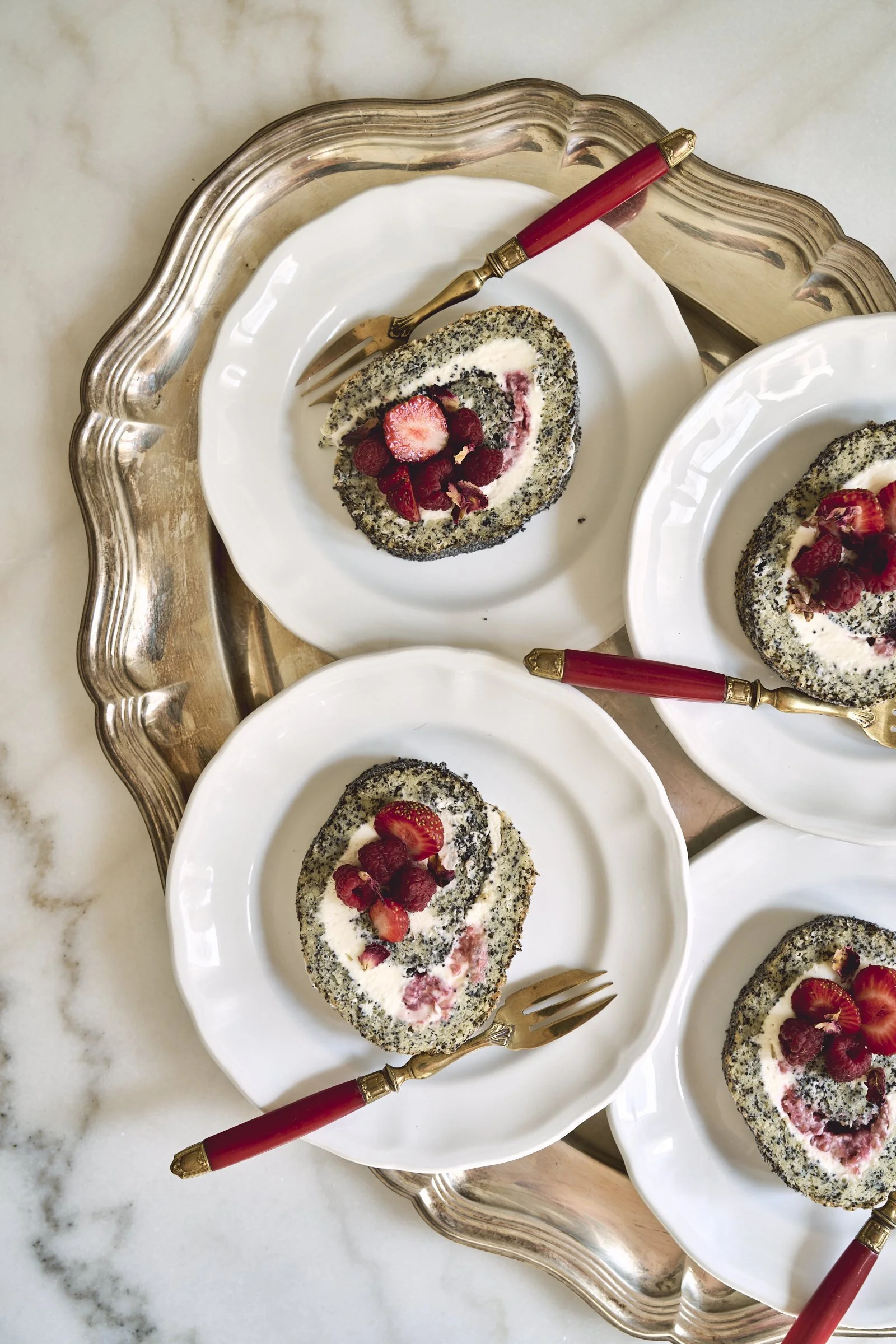 Poppy seed, rose, and raspberry berry roulade