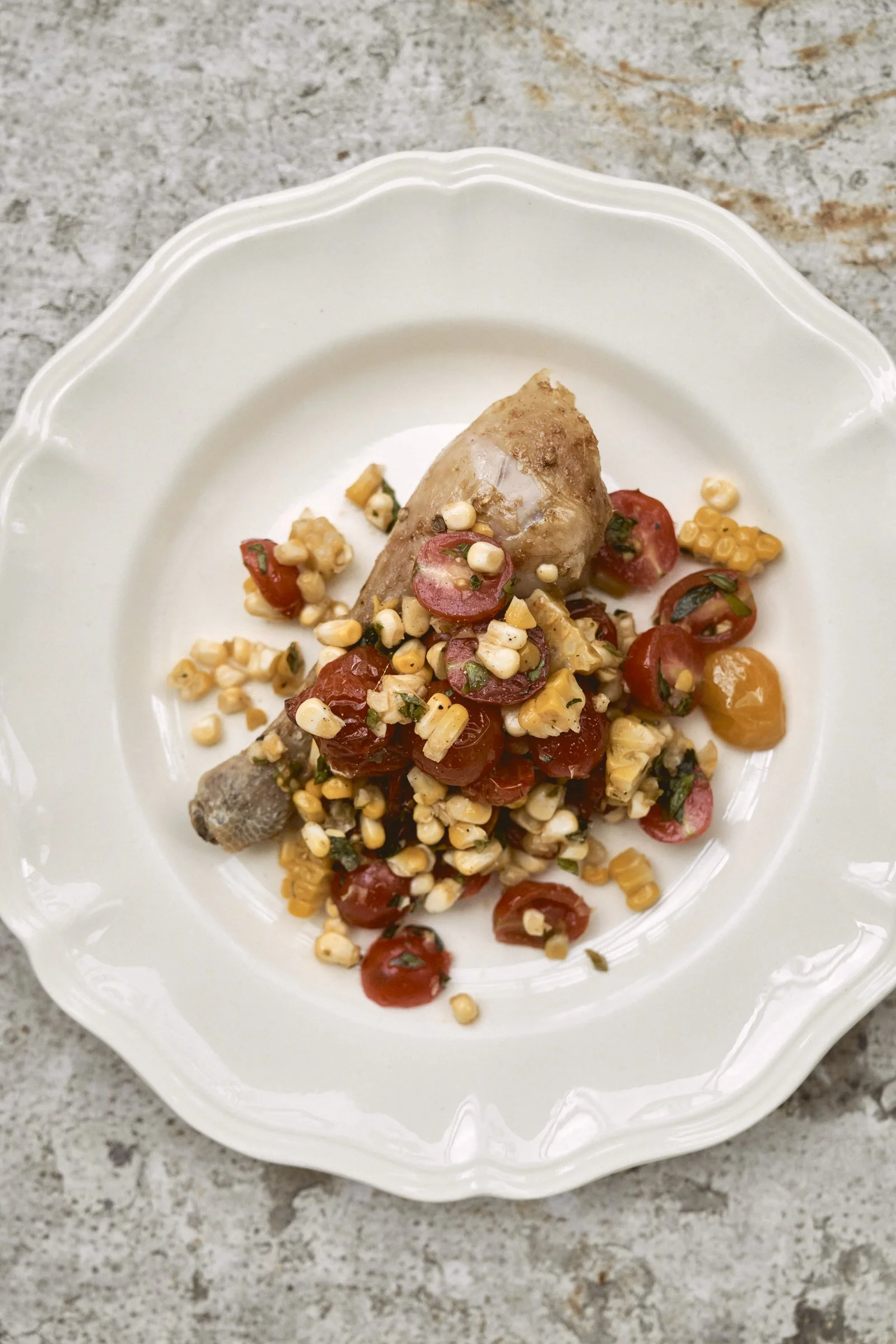 Chicken with corn and tomato salad