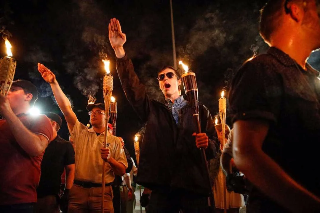 Image from Mykal McEldowney/IndyStar via USA TODAY Network In Charlottesville, Virginia 11/8/17 a group of neo-Nazis and White supremacists walked through the University of Virginia following a months-long debate over a Statue of Confederate General Robert E. Lee. Many Confederate statues have come under debate over the last of years as the statues are remnants of racist ideals left by violent slave mongering colonizers that unfortunately still linger, persist, and are re-ignited far too often and far too easily.