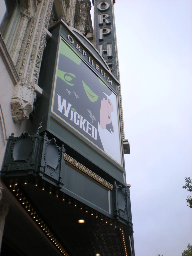 “Wicked ran at the Orpheum Theatre in San Francisco for almost two years” by Sarah Steirch was originally posted as “Wicked, Orpheum Theatre, San Francisco, August 2009” is licensed under CC BY-SA 2.0