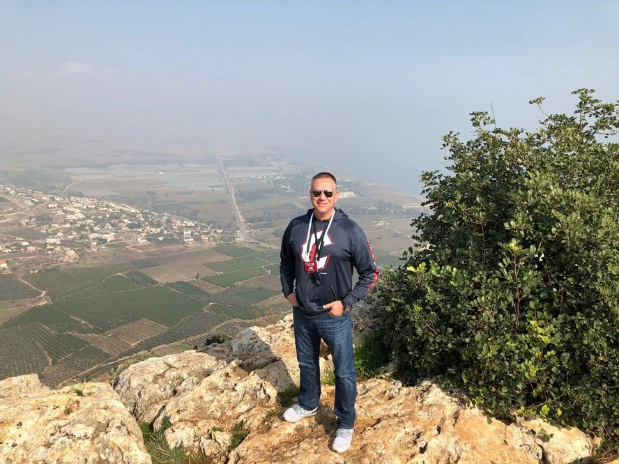 Copy of Copy of Rev. Dan with the Sea of Galilee to the right.