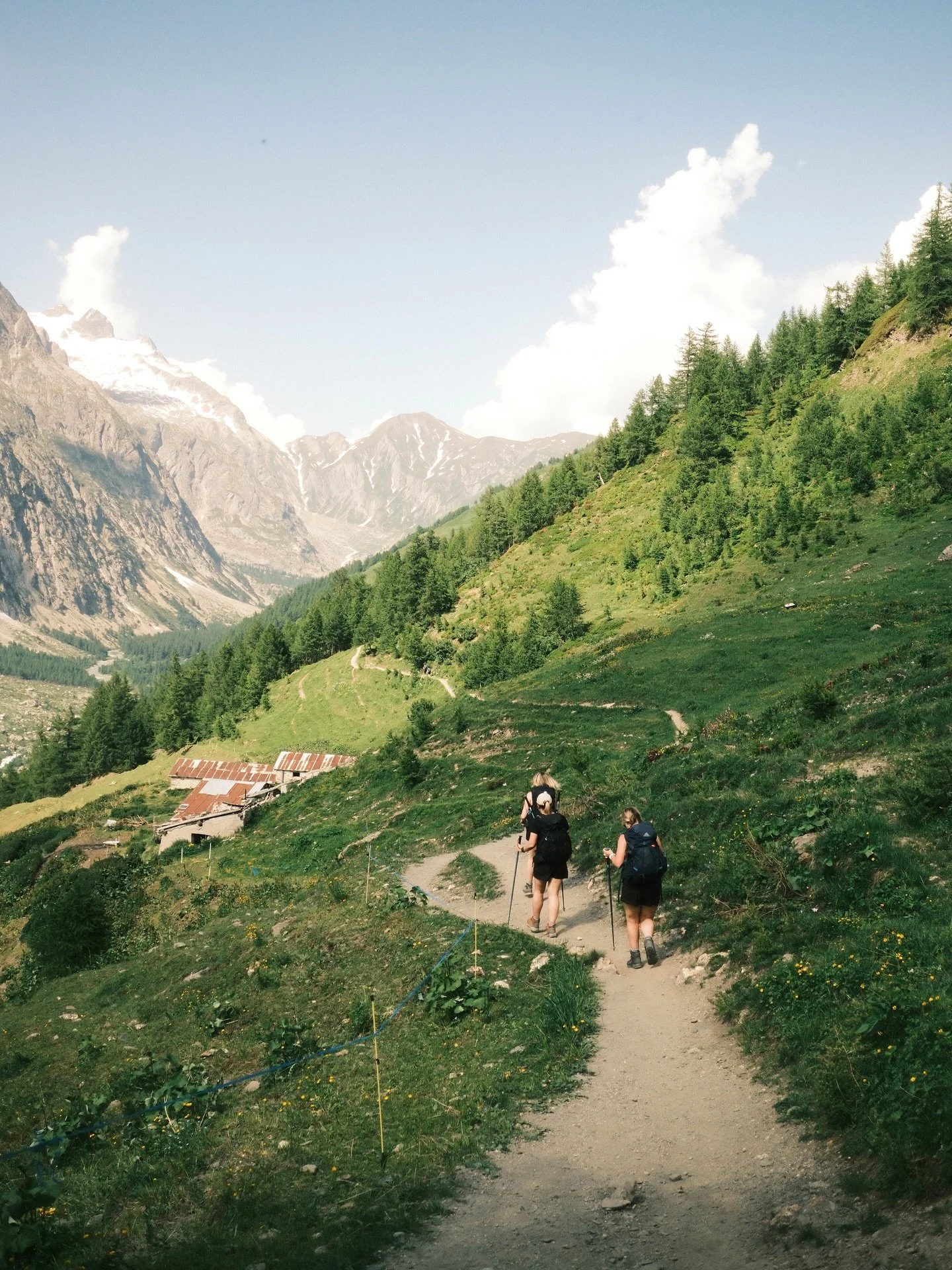 Day one of hiking the TMB over a long weekend. 

We begin by walking up a winding road with mountains stretching up on either side of us. I&rsquo;m not particularly good with transitions (and at this point there had been a lot of them) so I&rsquo;m r