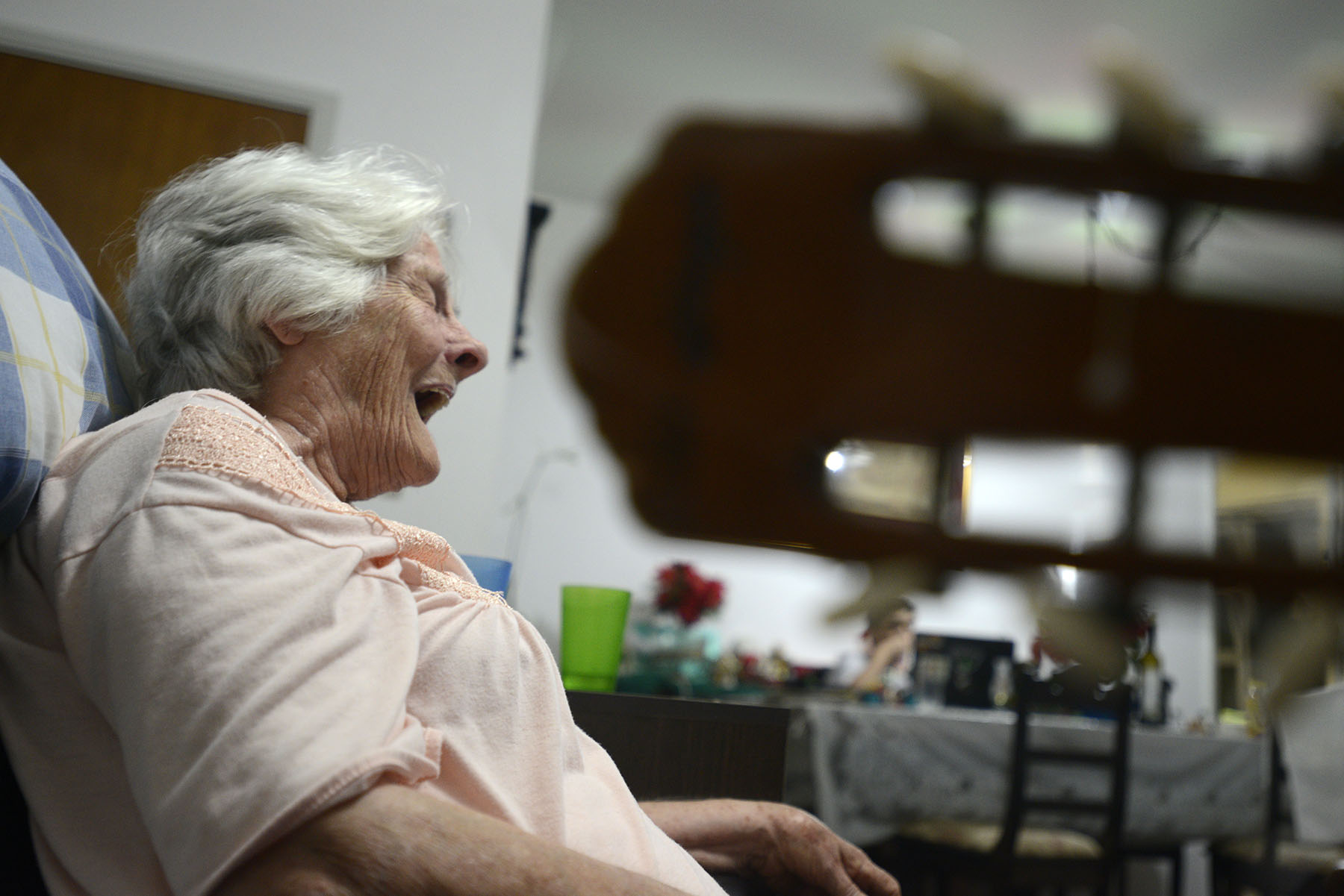  Maria Antonieta Rios, 85, laughs as she sings along to a song from her childhood by Adoriniran Barbosa on Jan. 1, 2016 in São José dos Campos, São Paulo, Brazil. Luiz Rios, her son, played the guitar and sang with her. Antonieta was diagnosed with A