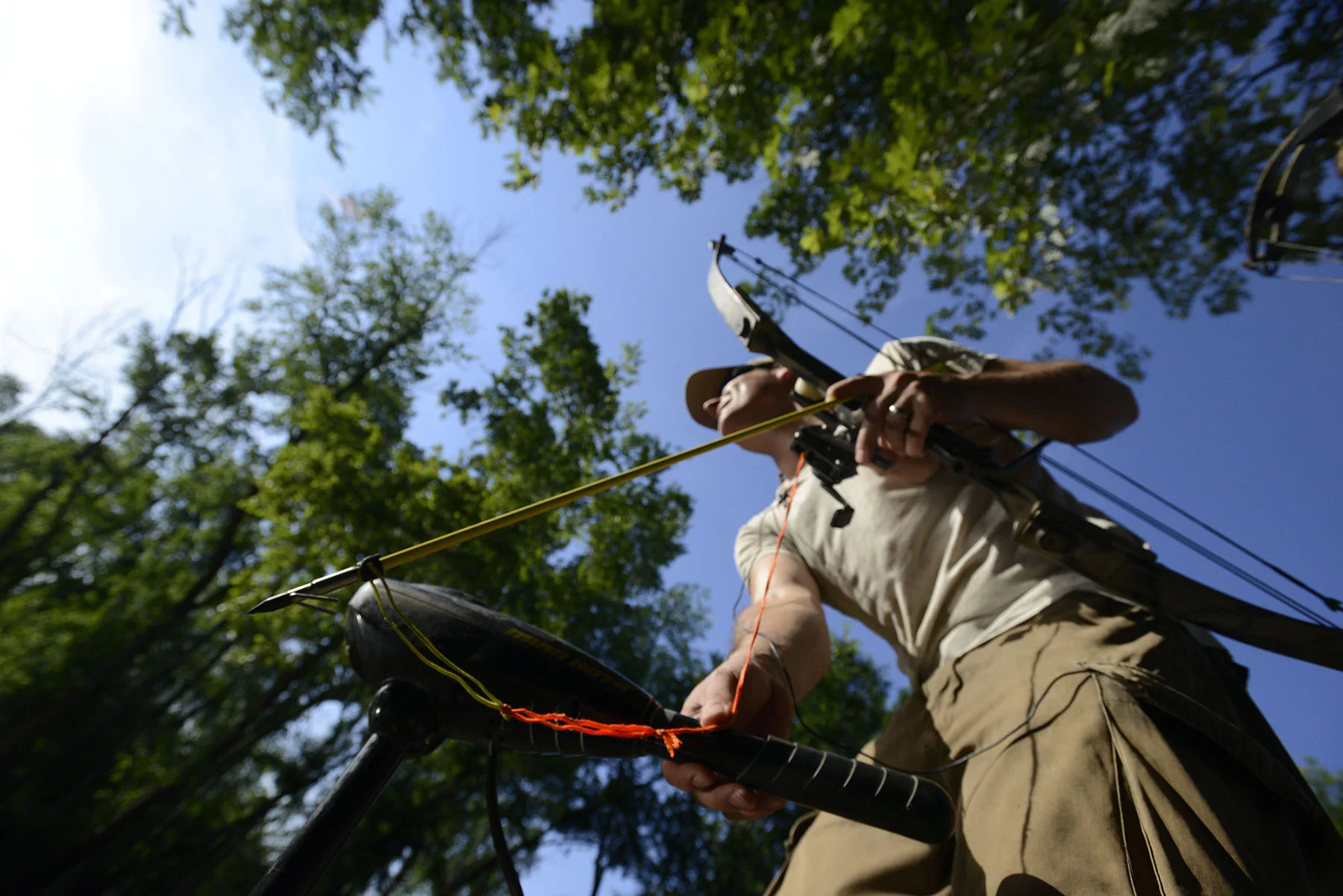  Columbia resident Guy Lanphere steers his boat while looking for carp along Moniteau Creek near Rocheport, Missouri, on June 10, 2015. Lanphere steered carefully and slowly so as not to scare any fish away. 