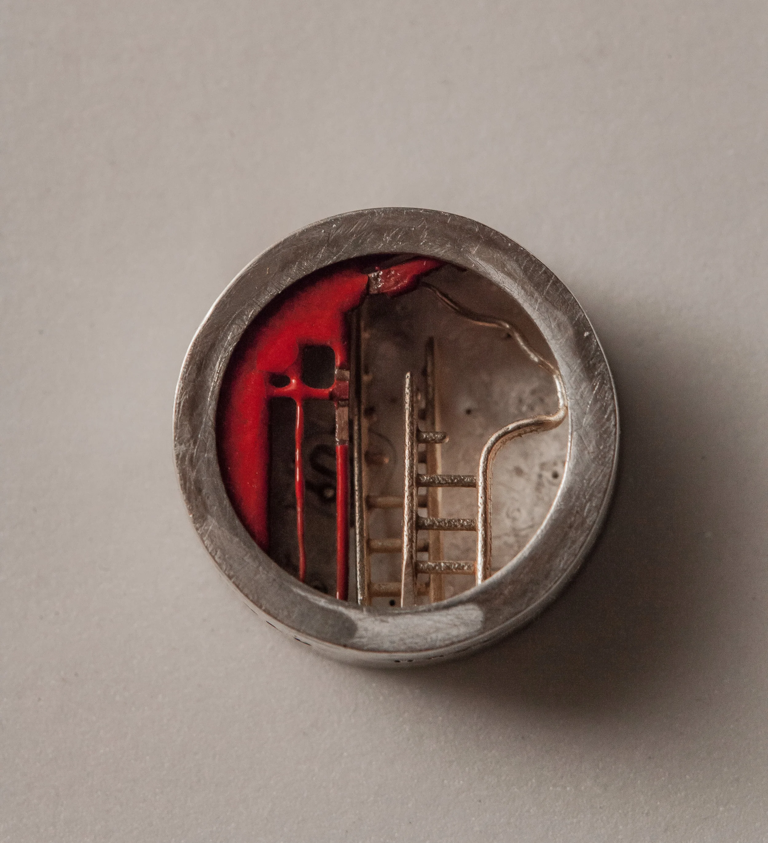  Silver, gold, enamel 