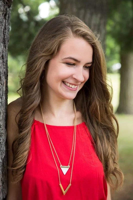 Senior portraits taken outdoors photographed by Kayla Duffney Creative.