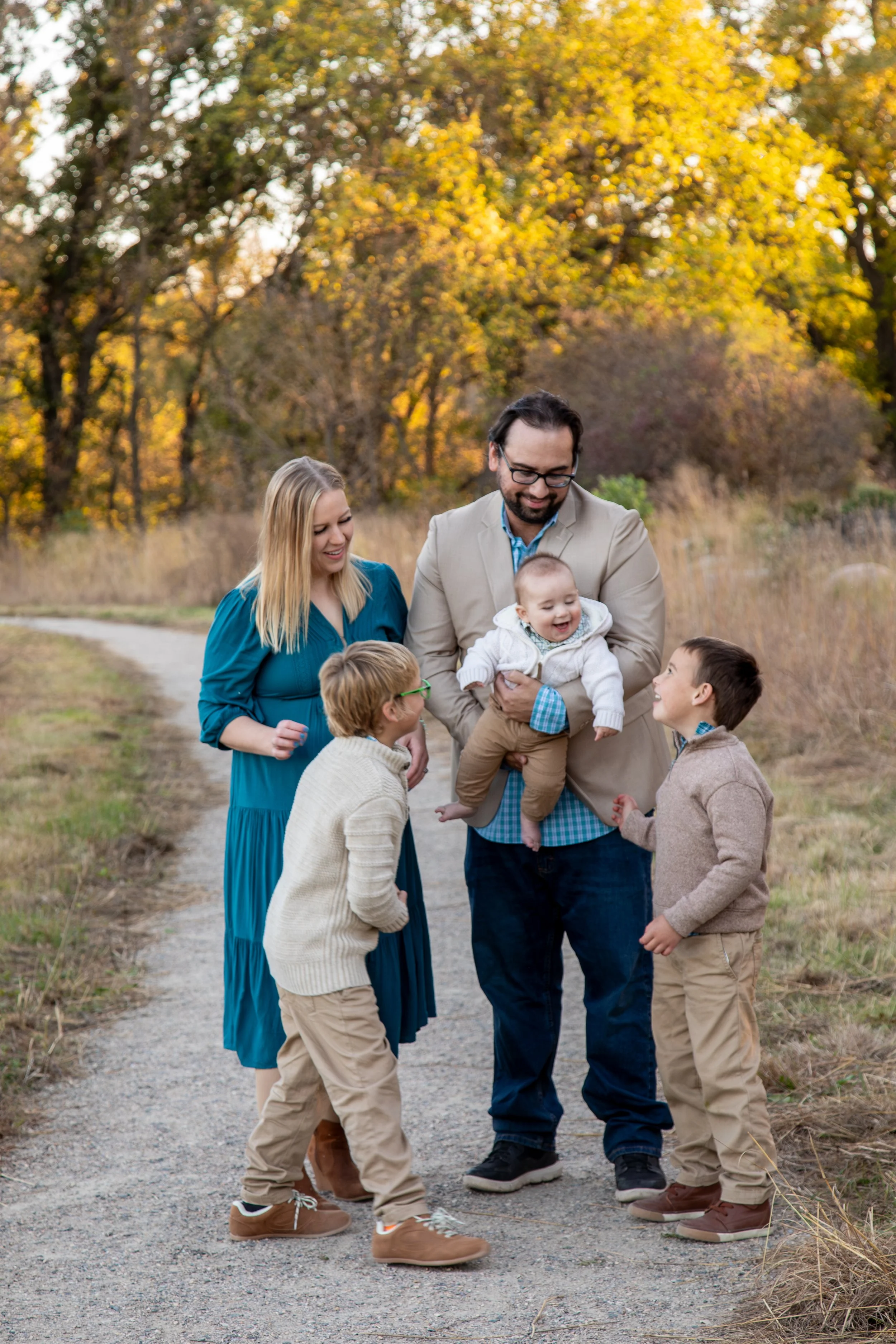 Outdoor family photoshoot in fall weather photographed by Kayla Duffney Creative.