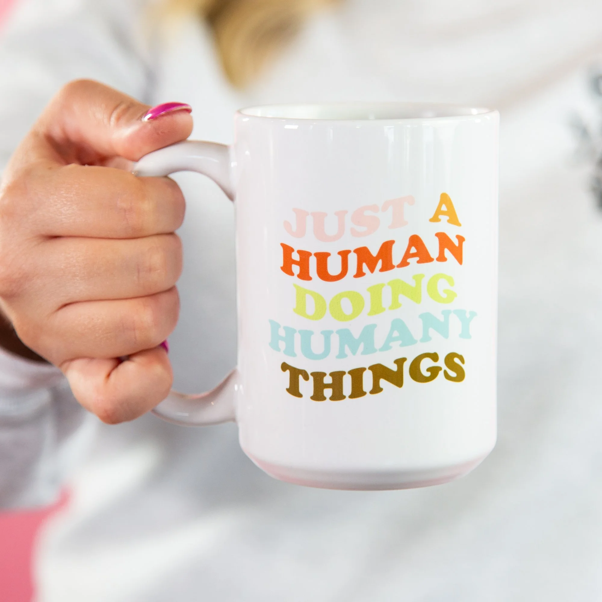 "Just a human doing humany things" coffee mug photographed by Kayla Duffney Creative.