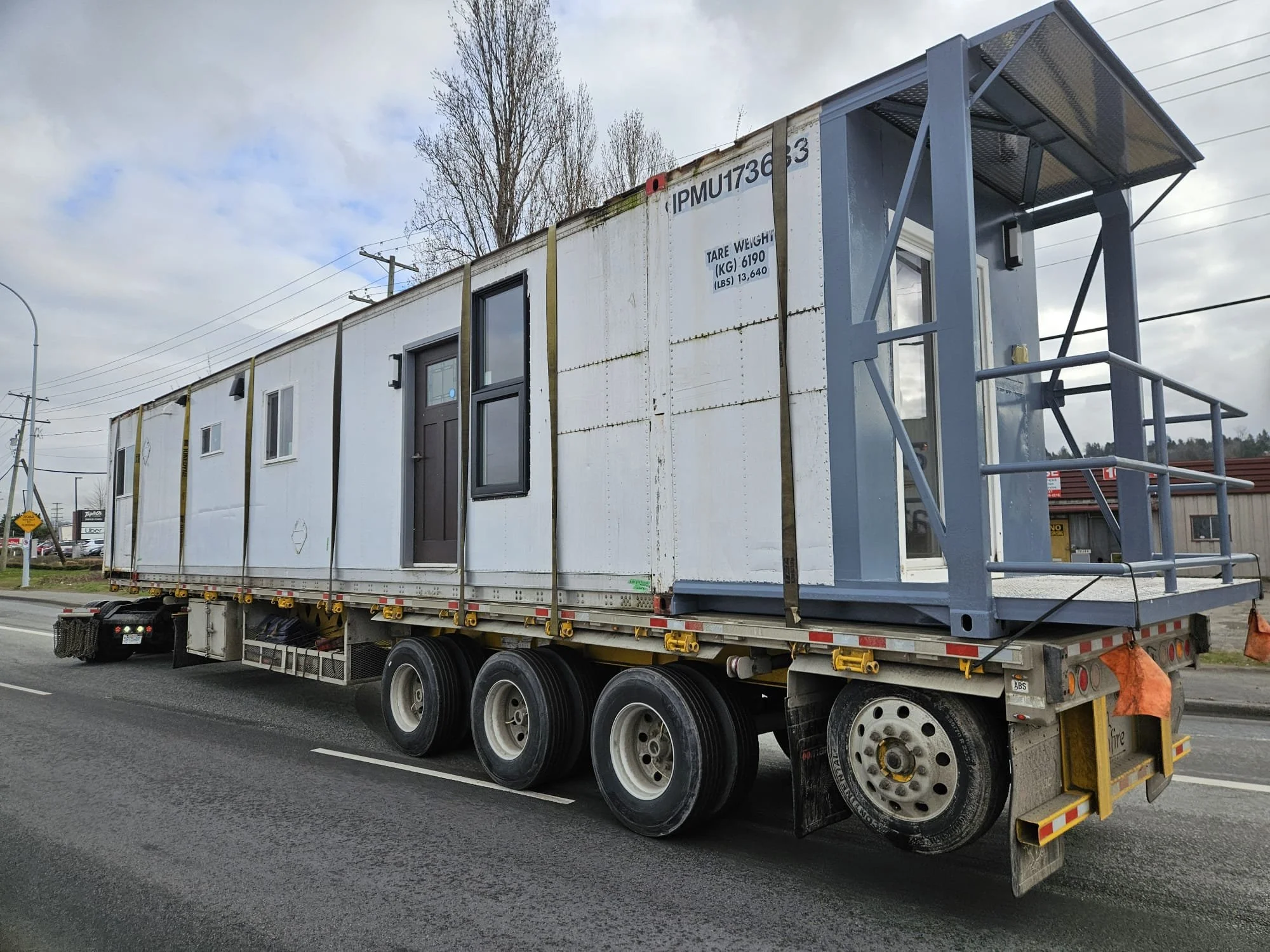 53-ft container home being delivered on-site