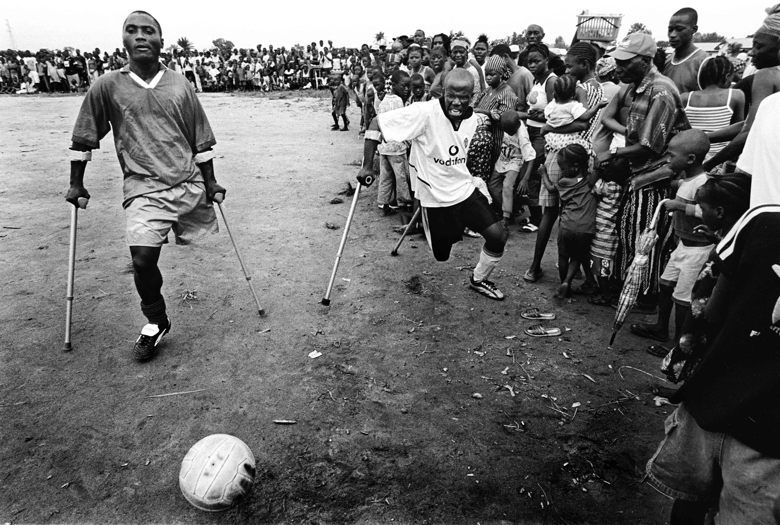 Sierra Leone, Freetown, June 2002, Football players from Murray's Dream Team during a match, which is being held to mark the team's commemoration day.