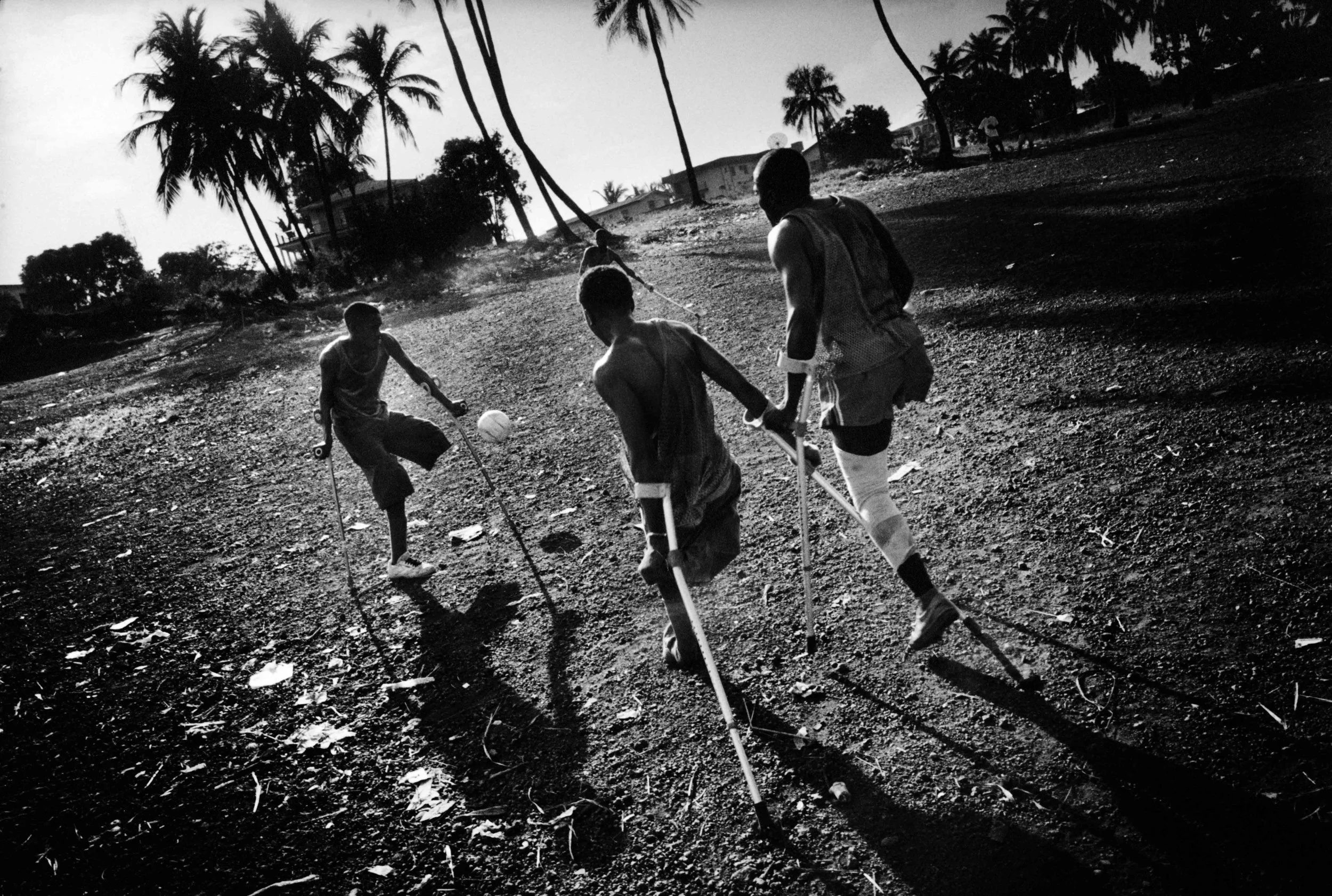 Sierra Leone, Freetown, June 2002, Amputees football field at the MSF camp a Saturday morning.