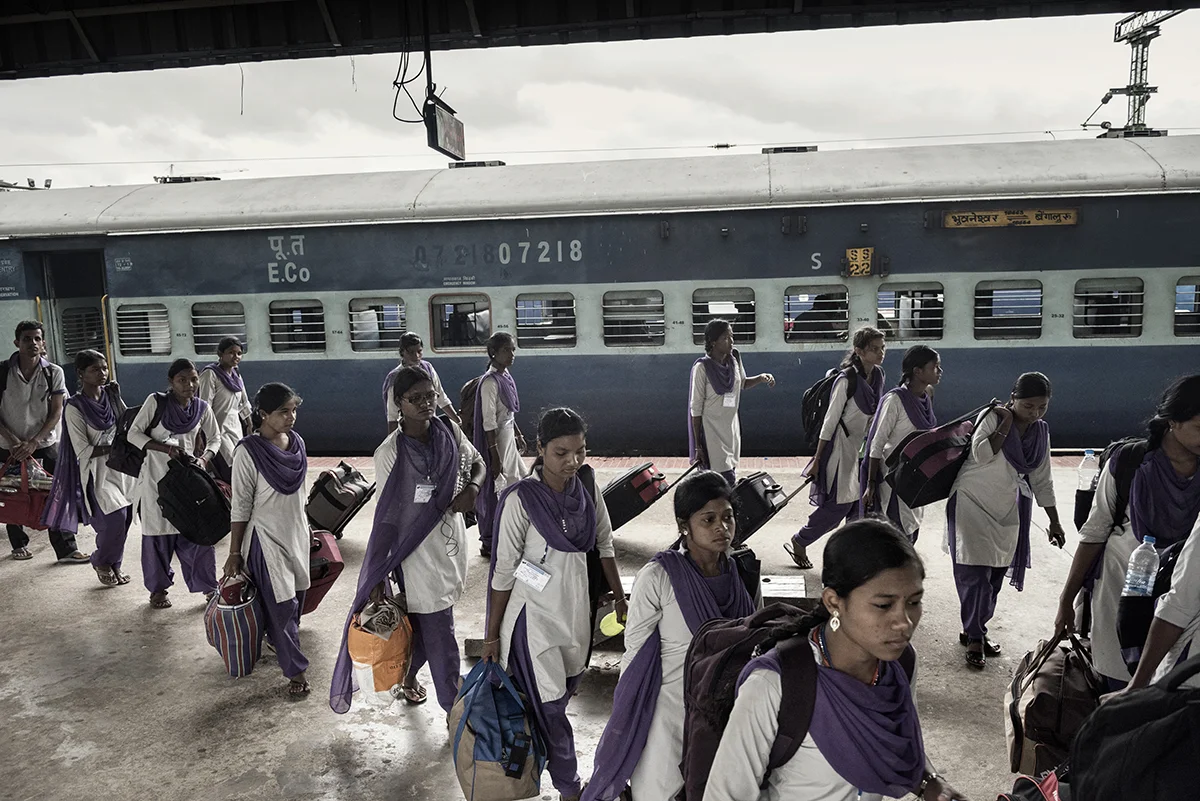 India, Bangalore, June 2016, Girls arriving in Bangalore in June from rural villages for their new factory jobs.