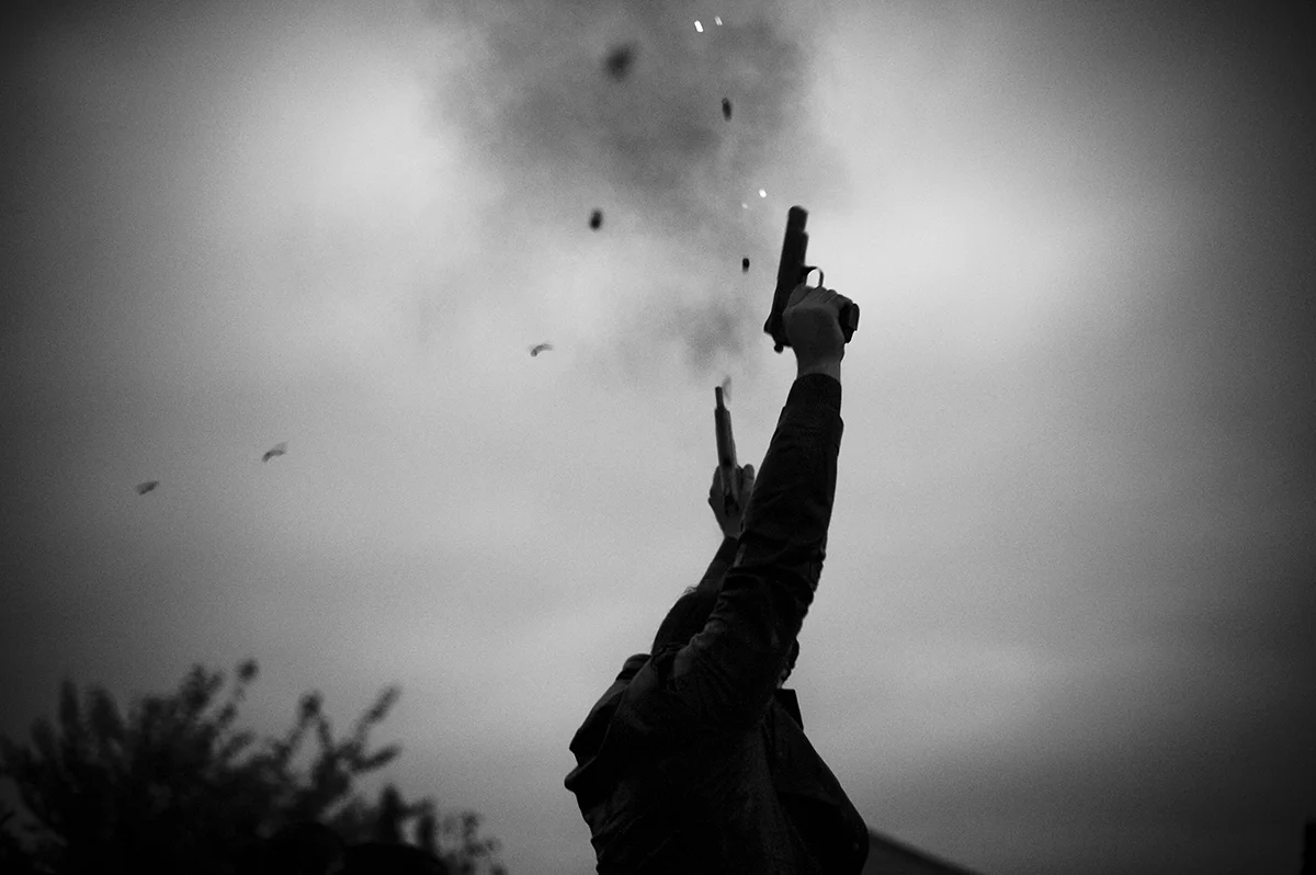 Russia, Ingushetia, October 2009, Guns are fired in the air to celebrate the wedding party for Medina Khamkoyeva.